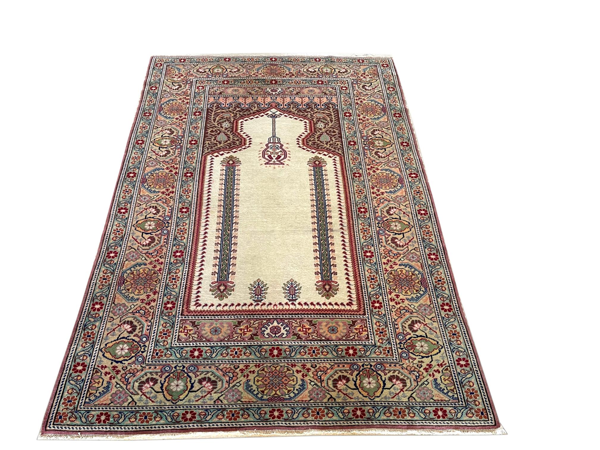 This authentic Hand woven rug is from Turkish Anatolia which is known for their great quality of handmade rugs. This unique rug has wool pile and cotton foundation. This is a prayer rug A great example of prayer rug tradition with artistically