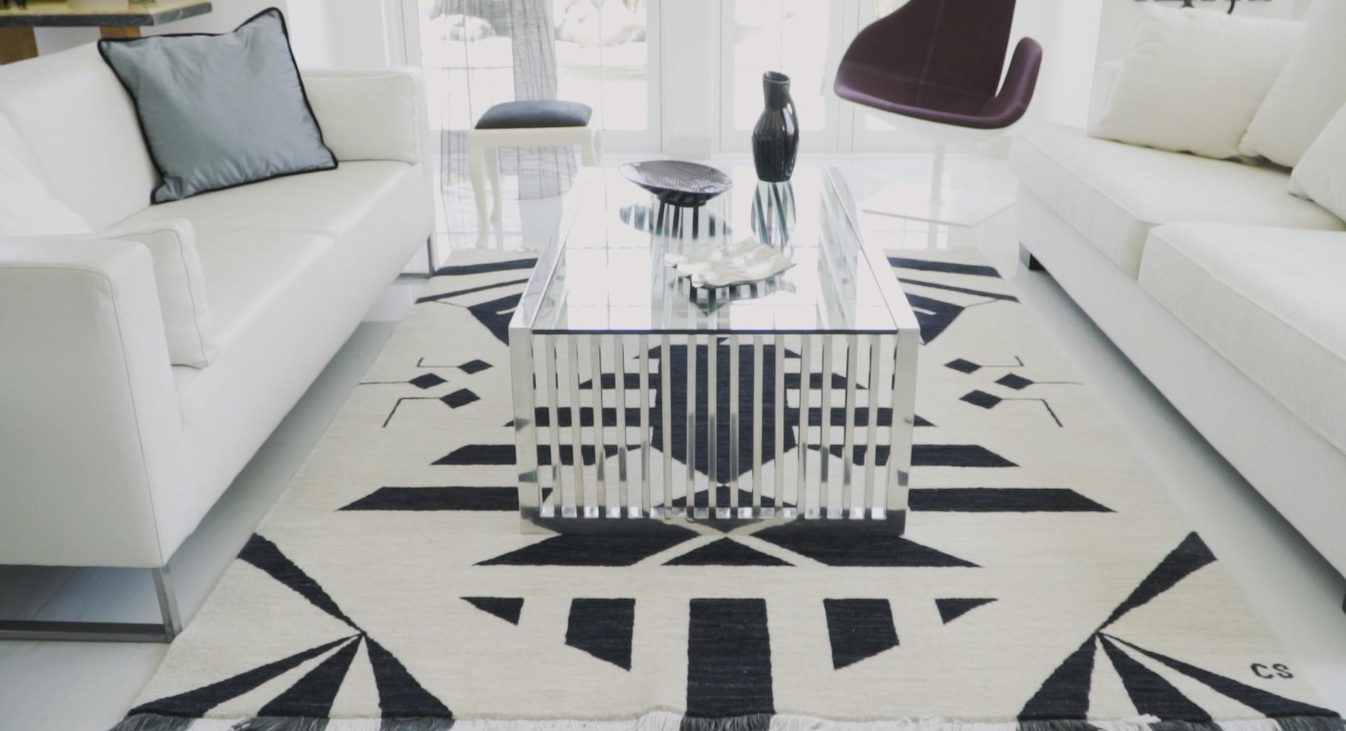 black and cream geometric rug