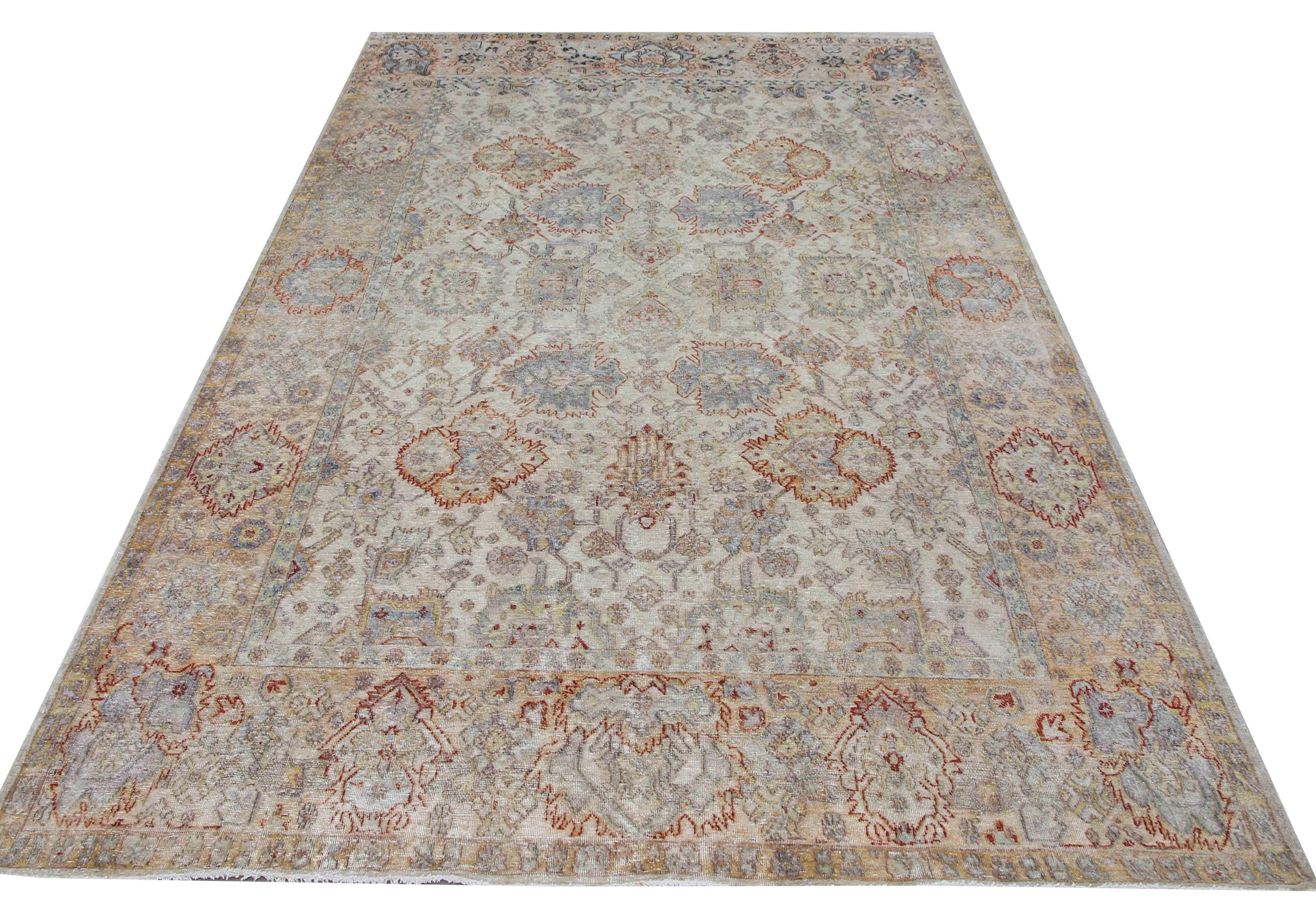 Inspired by traditional Khotan Design, the distressed silk texture features an icy blue base with ivory & rustic brown. Like the originals, it captures attention with its seamless weaving & timeless design. Measures: 7'9''x10'1''.