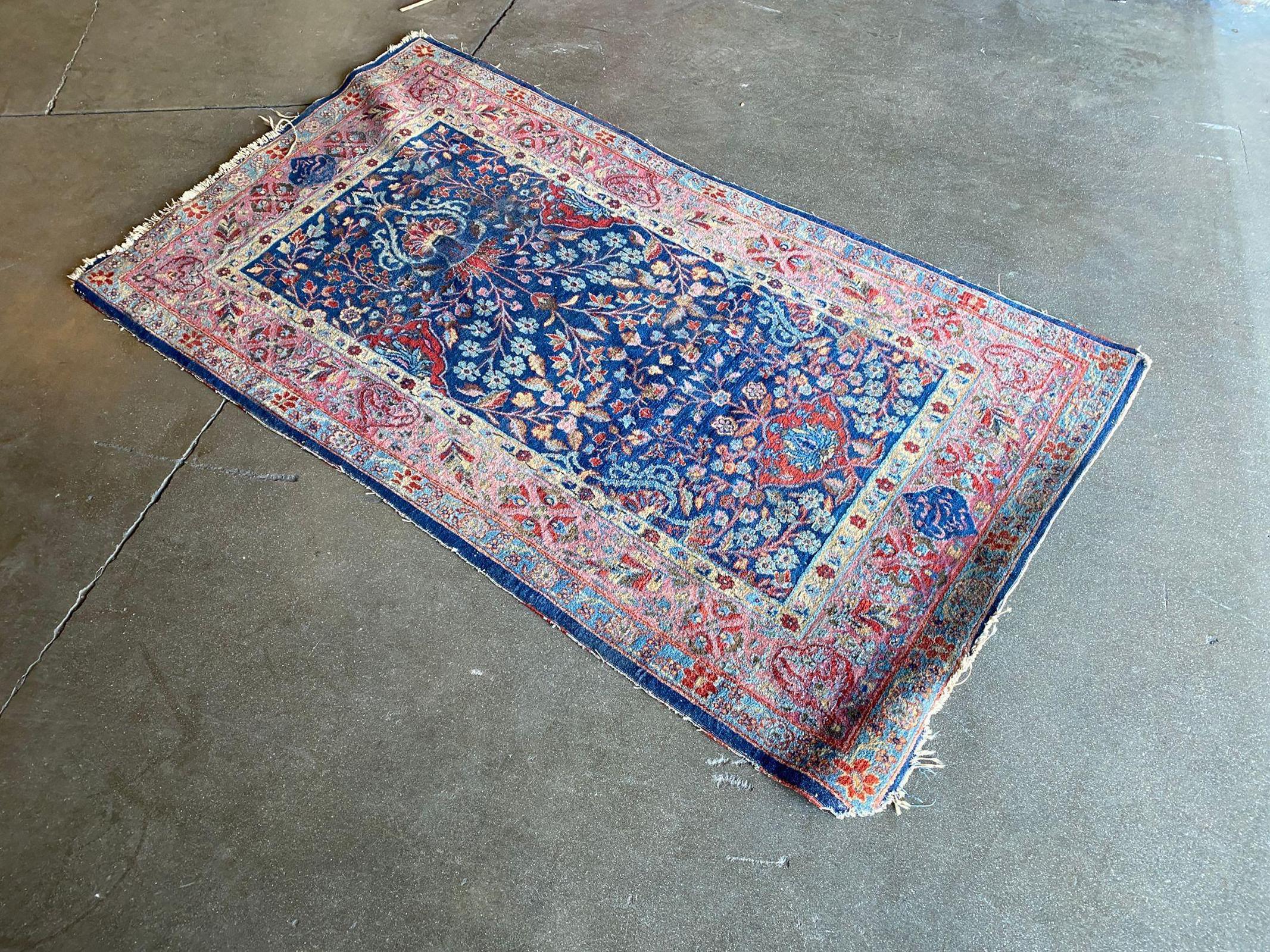 This authentic Persian Isfahan rug has wool and silk pile on a silk foundation. 
 
Circa 1950.