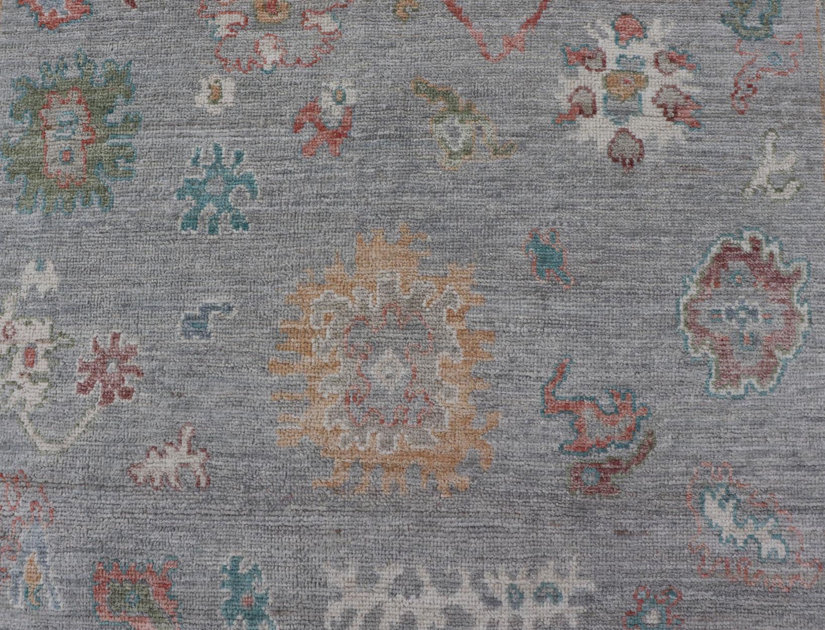 Measures: 5'8 x 9'0 
Hand Knotted Floral Modern Oushak With a Gray Background And Multi-Colors. Keivan Woven Arts; rug AWR-12167 / Country of Origin: Afghanistan Type: Oushak Design: Floral, All-Over, Abstract

This modern casual floral Oushak