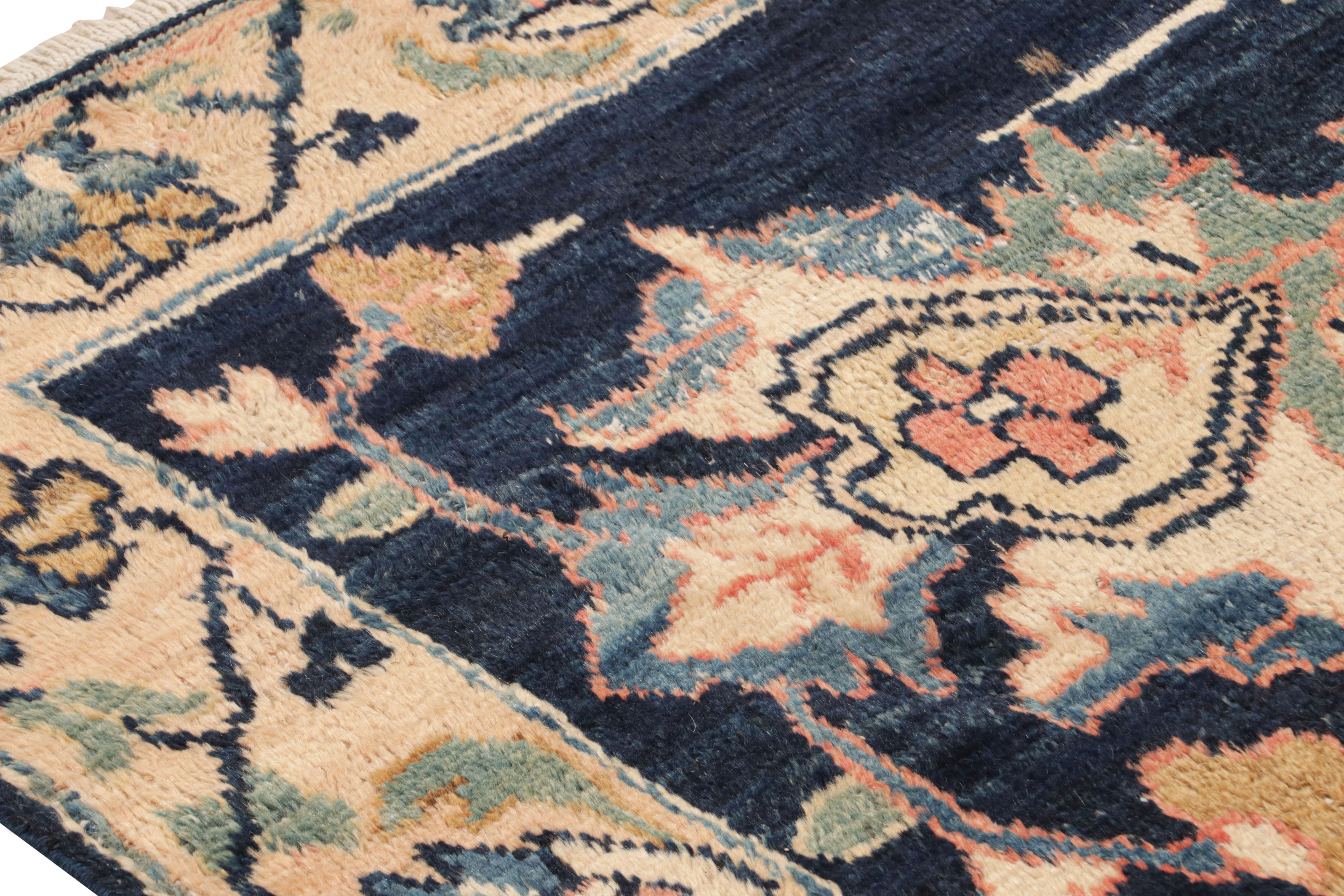 Mid-20th Century Hand Knotted Floral Vintage Persian Runner in Blue and Yellow by Rug & Kilim For Sale