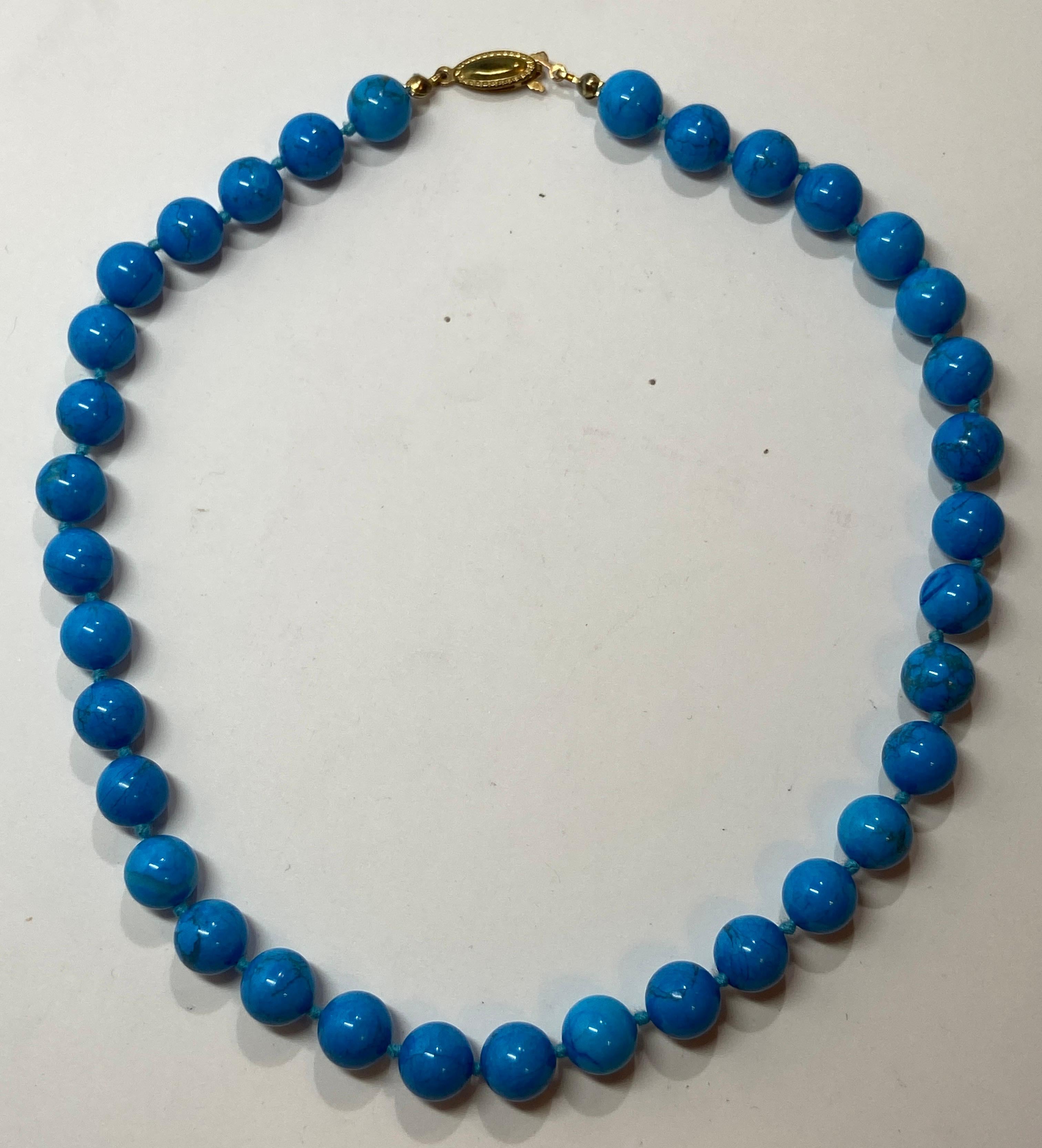      This wonderful choker, made with Howlite stones in turquoise color is hand-knotted and finished with a gold hardware clasp. Believed to help relieve stress, as well as to help open up memories if your previous lives, this elegant necklace sit