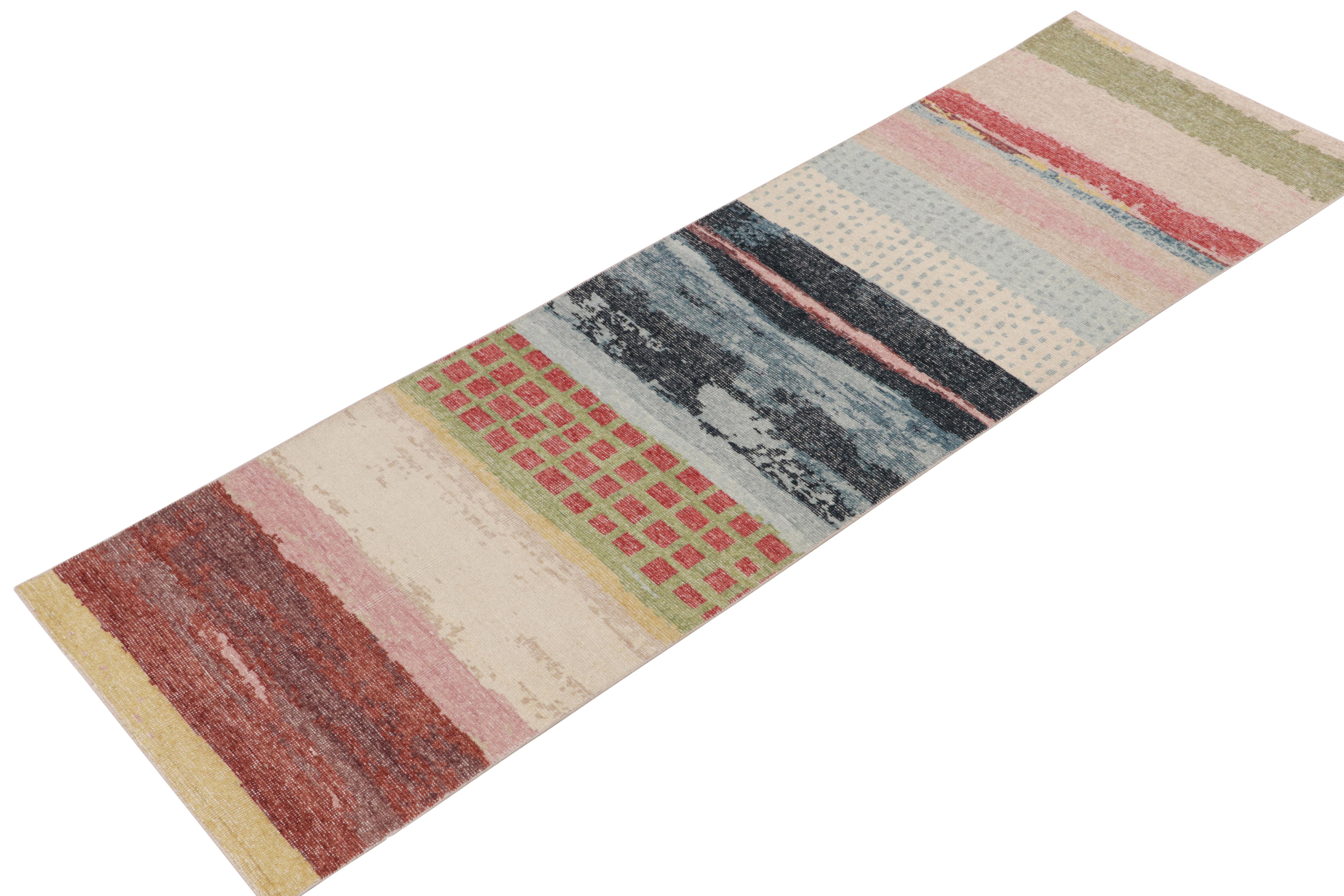 Hand-knotted in wool, a 3x10 runner from Rug & Kilim’s Homage collection. 

On the Design: The pattern enjoys brilliant pagination in an enticing color play of variegated shades in blue, red, green & pastel pink; uniquely complementing the