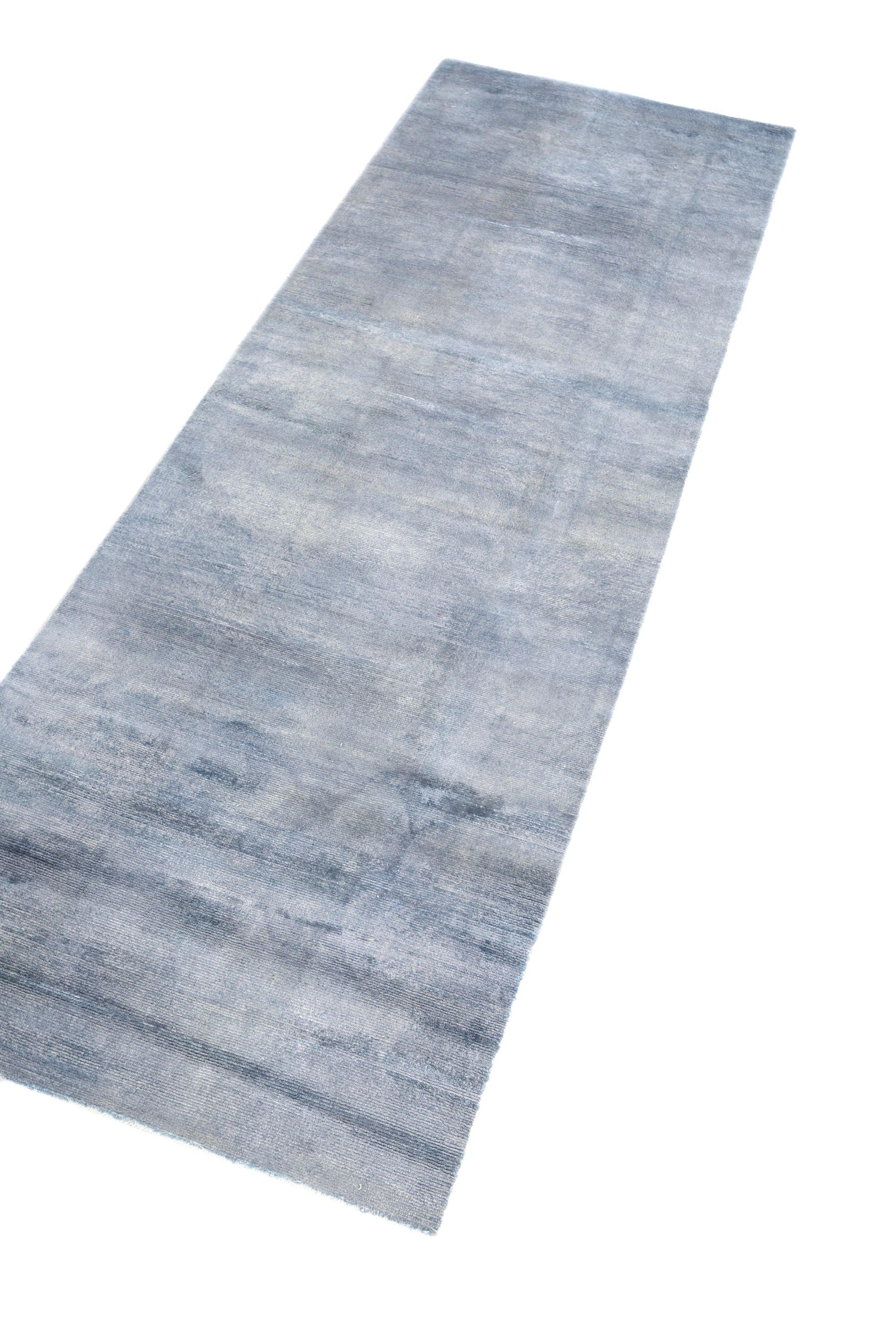 Add an earthy elegance to your space with this hand-loom Jaipur rug in a rich chicory brown hue. Crafted from premium viscose, this rug features a subtle textural design that adds depth and sophistication to any setting, from rustic to contemporary