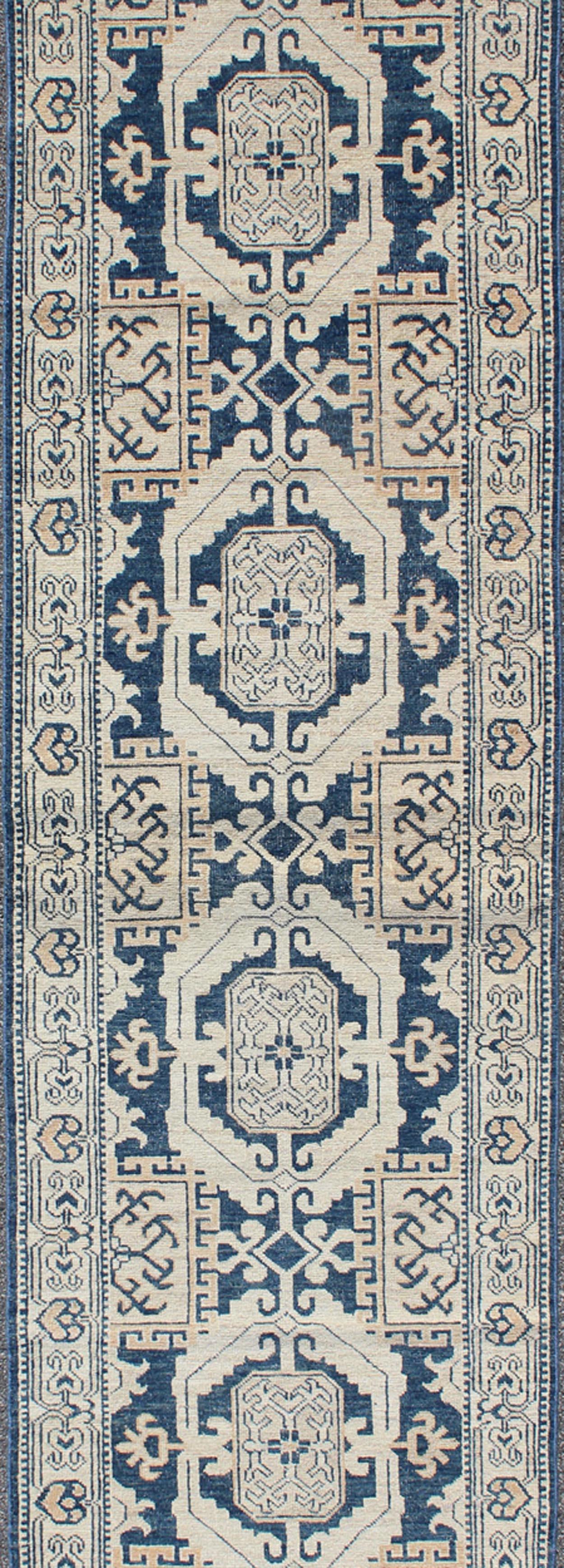Hand-Knotted Hand Knotted Khotan Runner with Geometric Medallions in Navy and Cream Tones For Sale