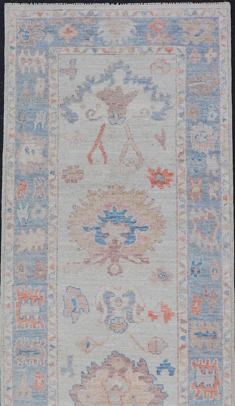 Contemporary Hand-Knotted Medallion Oushak Design Runner featuring Faded Colors For Sale