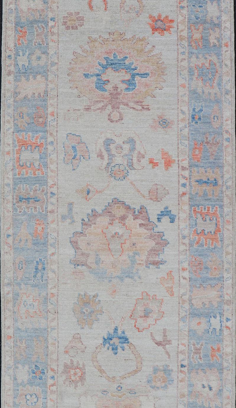 Wool Hand-Knotted Medallion Oushak Design Runner featuring Faded Colors For Sale
