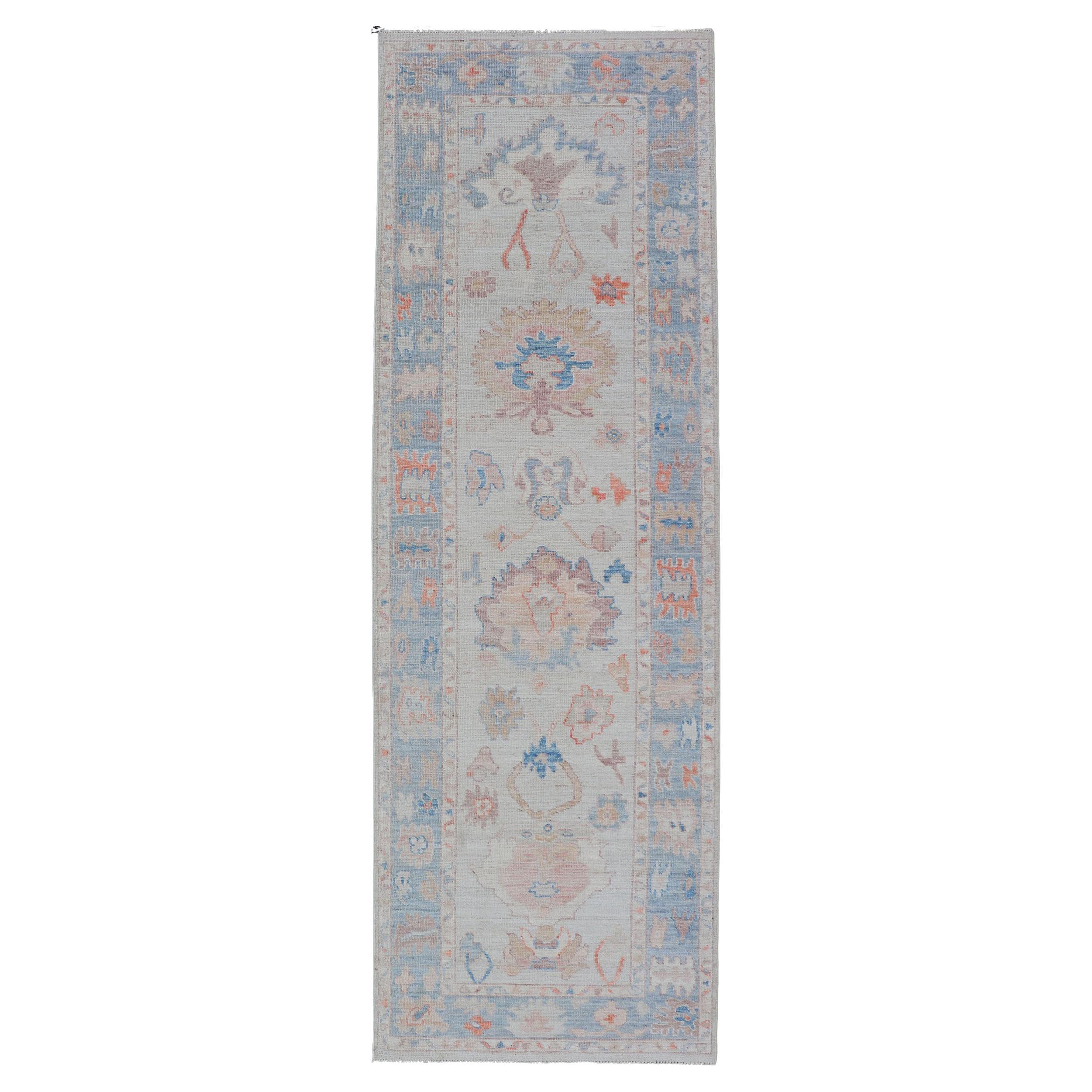 Hand-Knotted Medallion Oushak Design Runner featuring Faded Colors For Sale