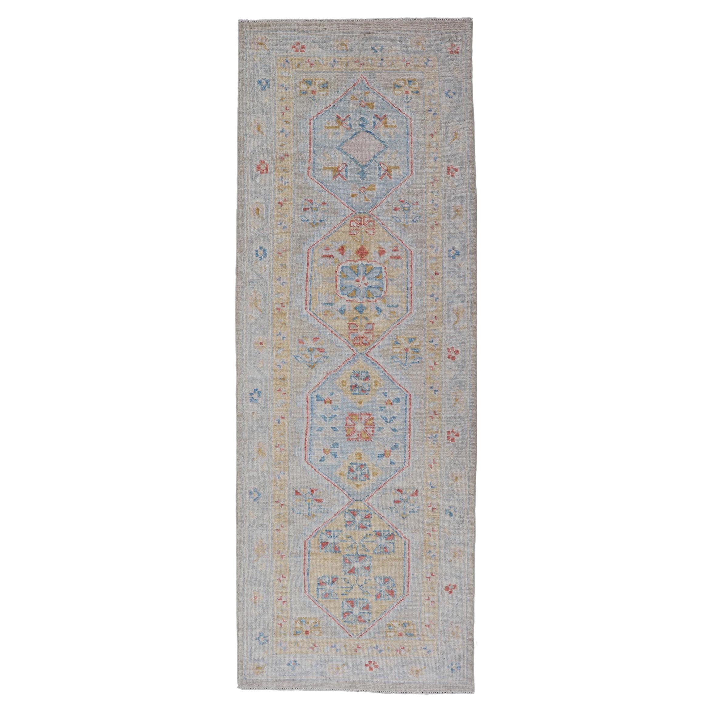 Hand-Knotted Medallion Oushak Design Runner featuring Faded Yellow and Blue's For Sale