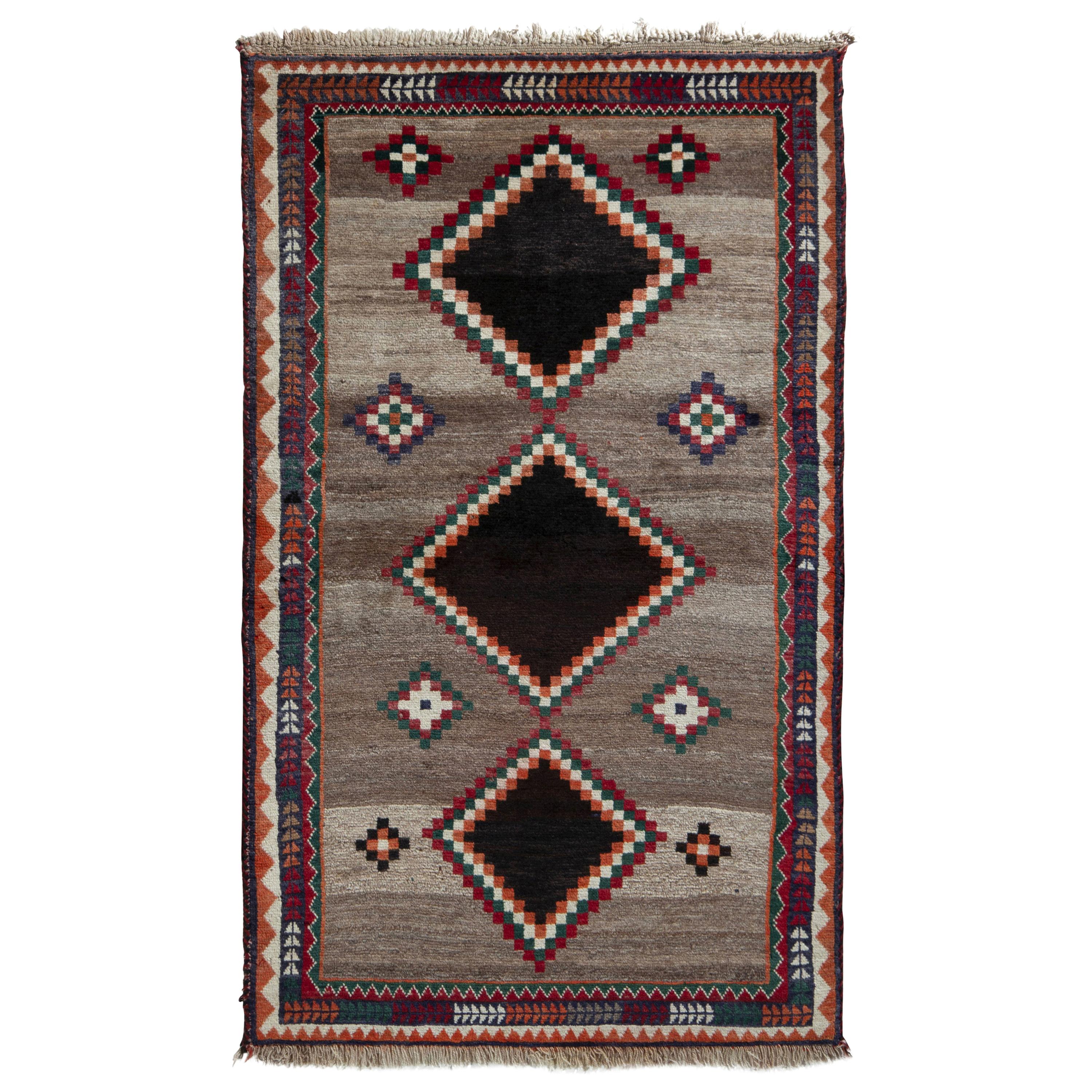 Handgeknüpfter Gabbeh Vintage-Teppich aus der Mitte des Jahrhunderts mit beigem Stammesmuster von Teppich & Kelim