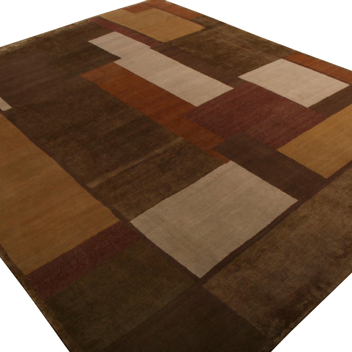 Exemplifying cubism and Art Deco sensibilities, this 8x10 rug from Rug & Kilim’s New & Modern collection features a geometric pattern in panel style flourishing in luscious brown & cream tones for an enticing pagination on scale. Hand-knotted in a
