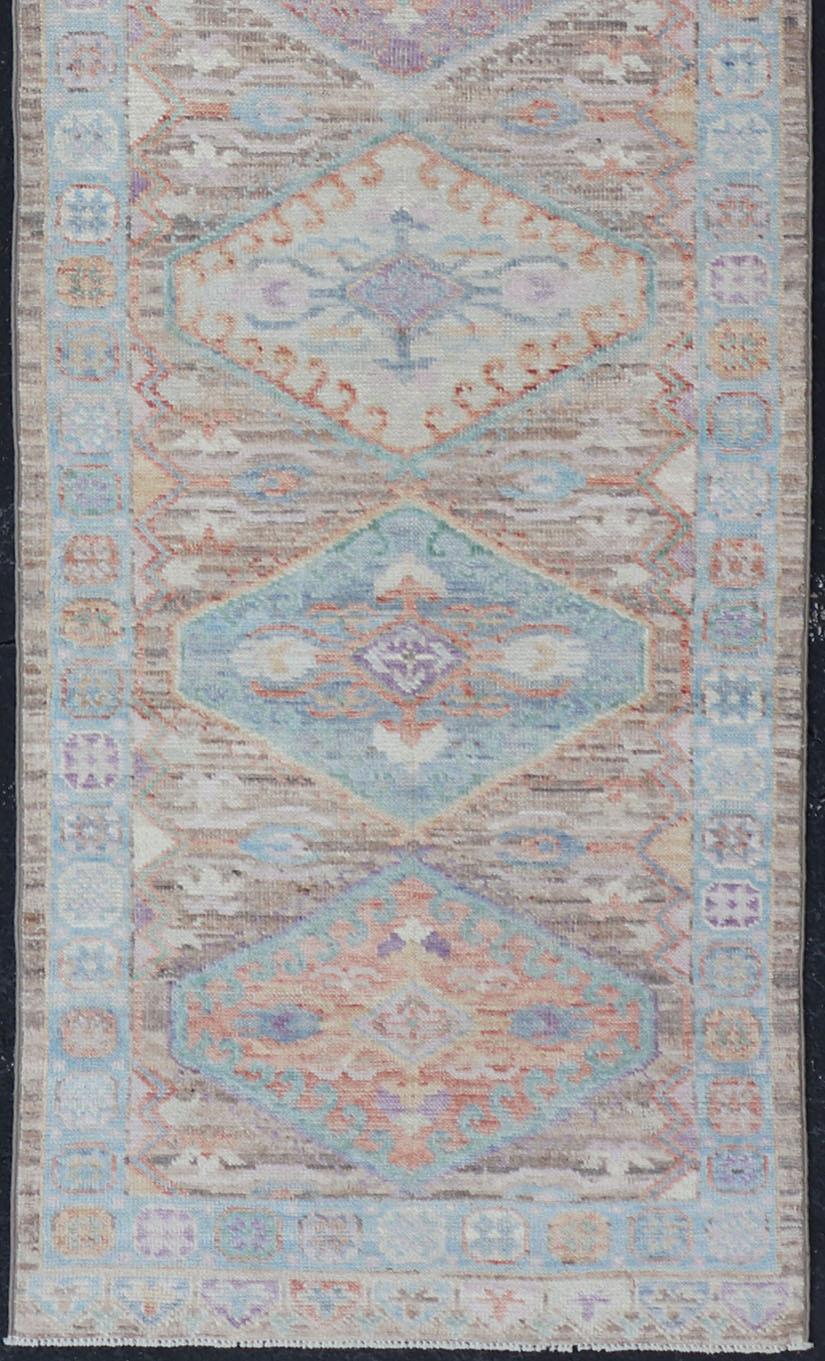 Hand Knotted Modern Oushak Geometric Medallion Designed Runner. Hand Knotted Modern Oushak Medallion Designed Runner, Keivan Woven Arts; rug AWR-5118 Country of Origin: Afghanistan Type: Oushak circa 2010

Measures: 2'6 x 9'7
 
This Afghan