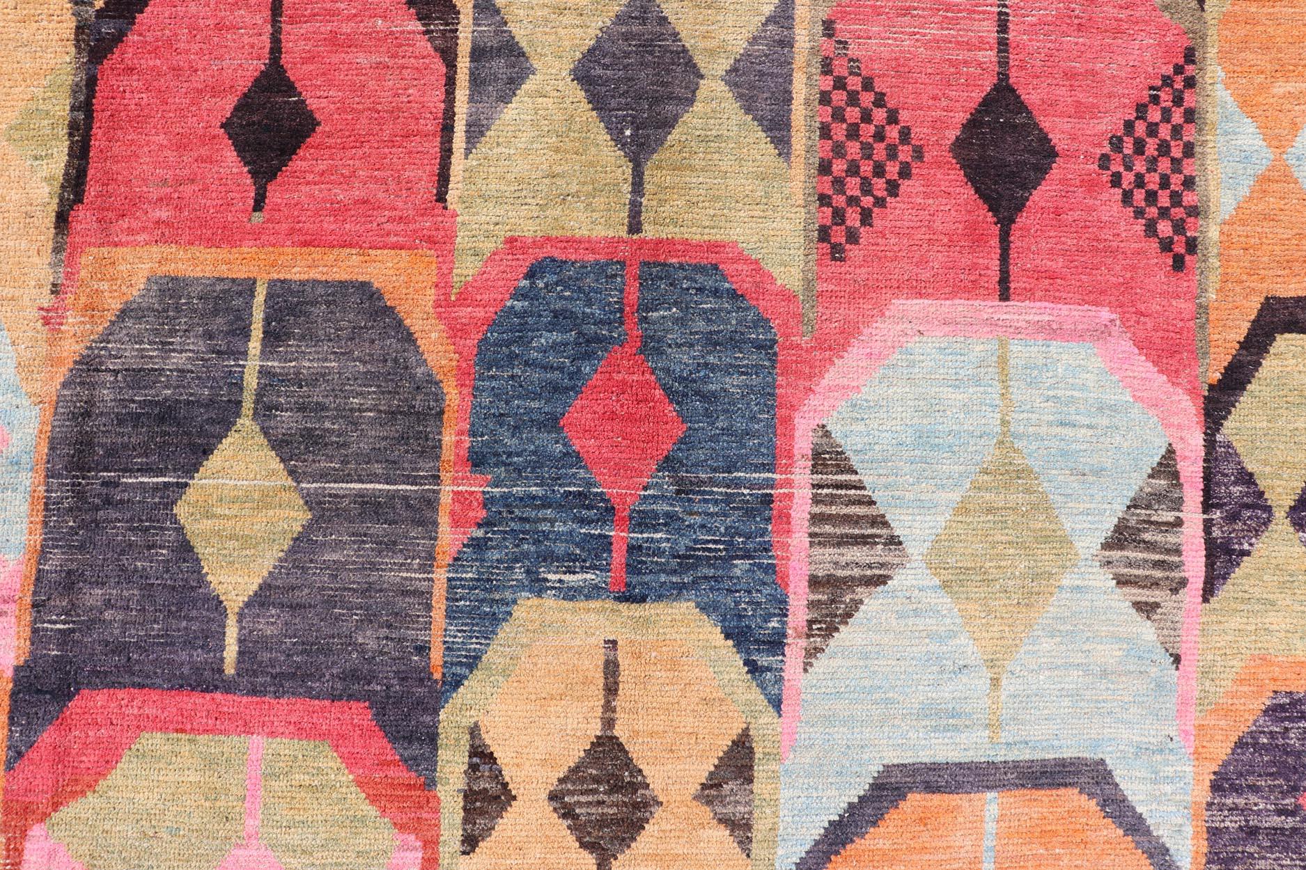 Multicolor Modern Rug in Art Deco Design, Keivan Woven Arts; rug AFG-40933, country of origin / type: Afghanistan / Modern Casual, circa early-21th century.

Measures: 9'5 x 12'1.

Multicolor Modern Rug in Art Deco Design. This modern rug has been