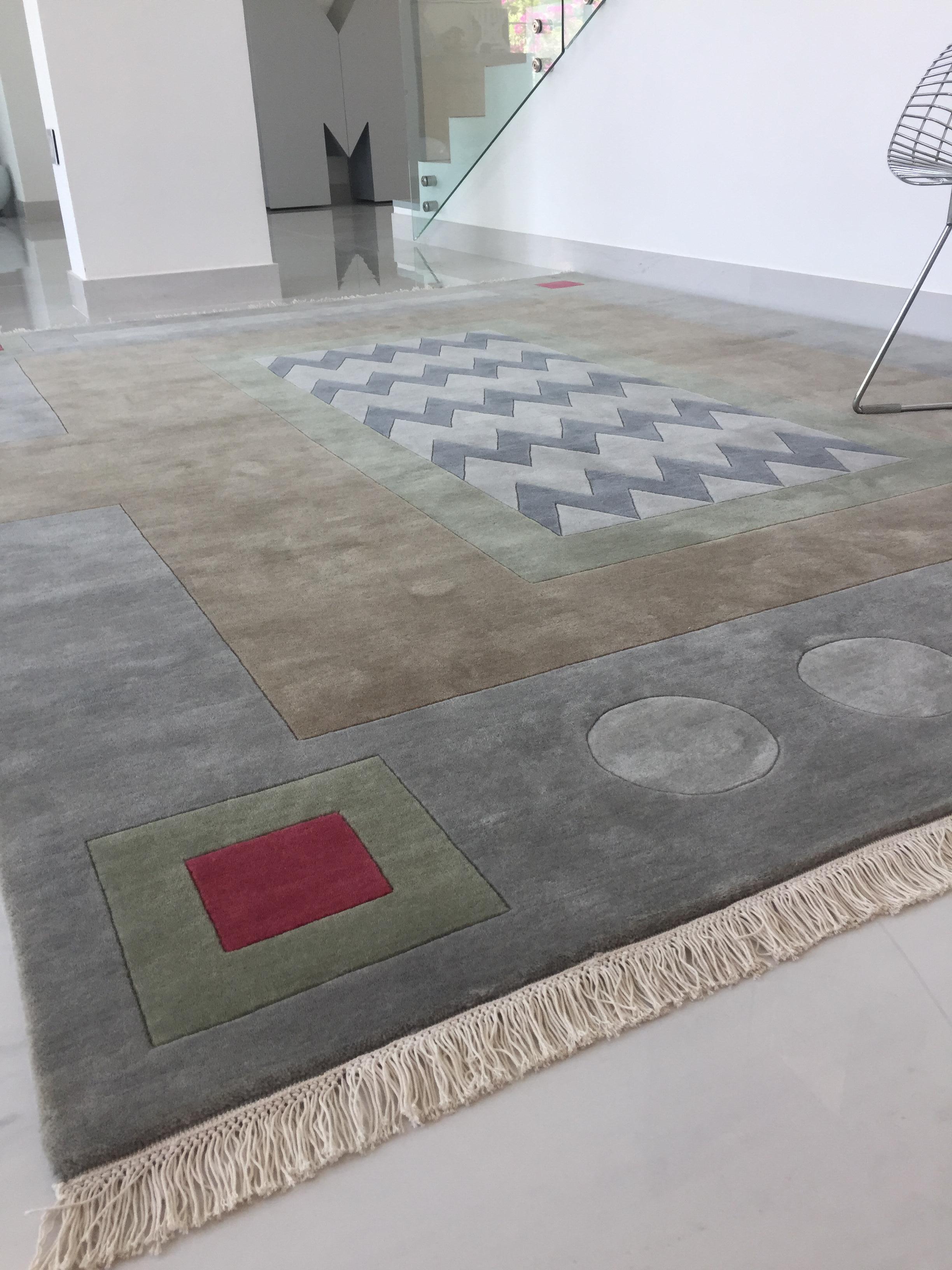 green and neutral rug