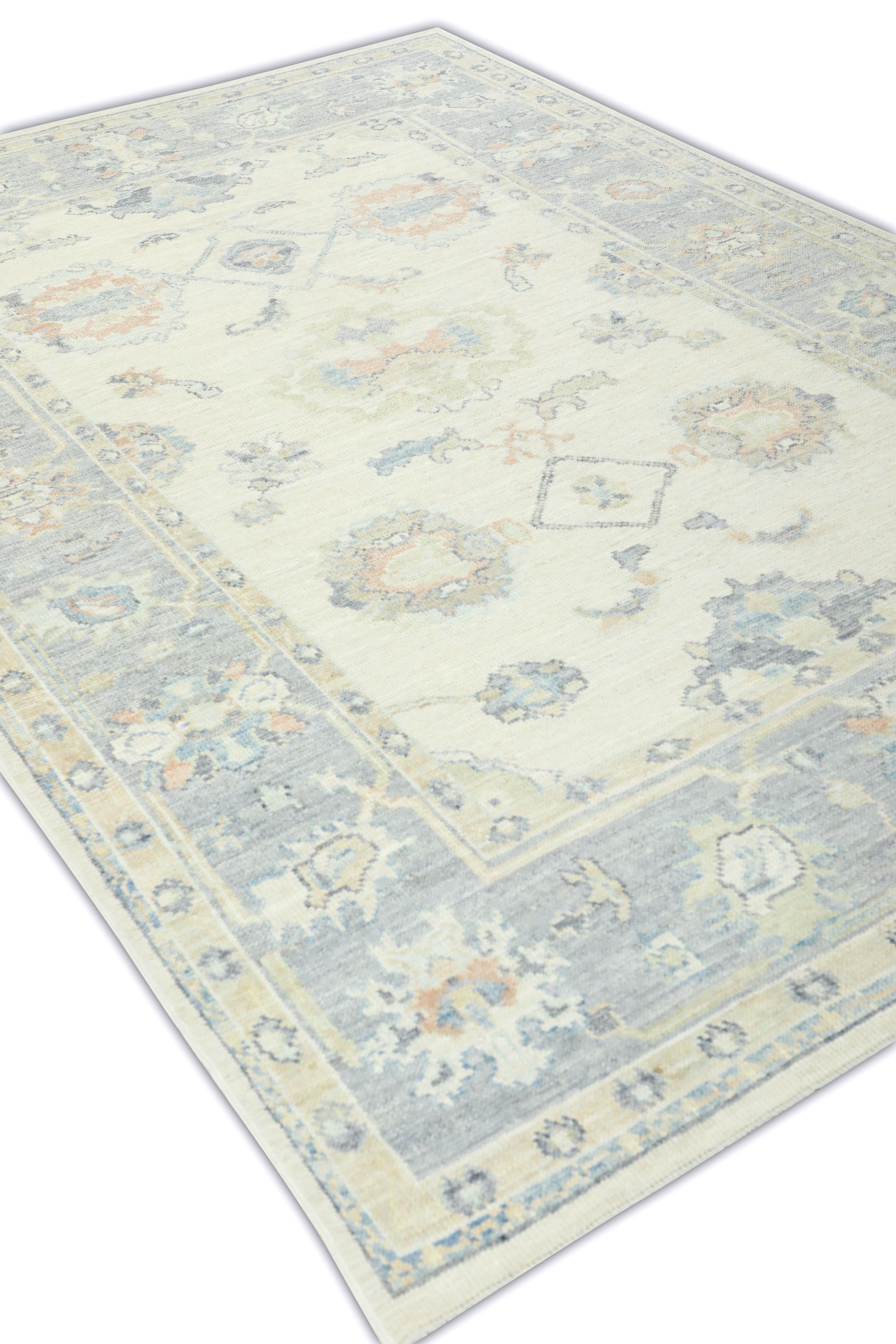 This Turkish oushak rug is a stunning piece of art that has been handwoven using traditional techniques by skilled artisans. The rug features intricate patterns and a soft color palette that is achieved through the use of natural vegetable dyes.