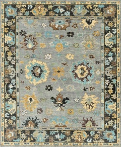 Tapis en laine « Oushak Revival » noué à la main, dans les tons gris, marron foncé et bleu ciel
