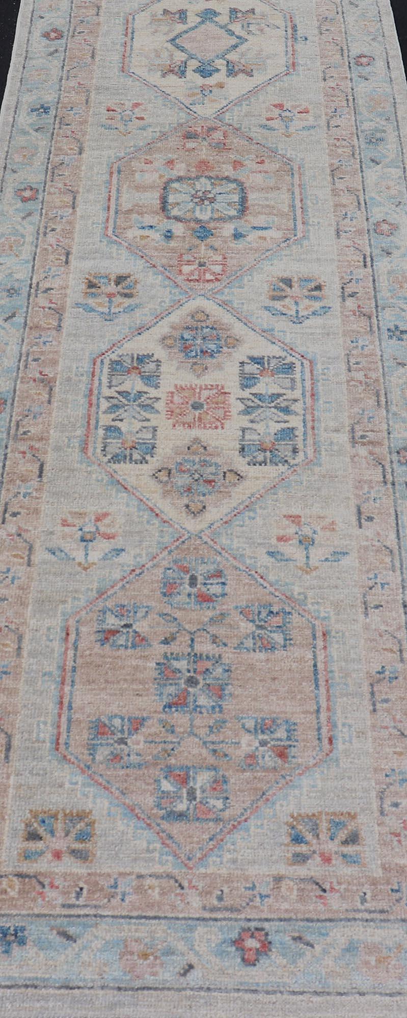 Wool Hand-Knotted Oushak Runner with Medallion Design On A Cream Field With Blues For Sale
