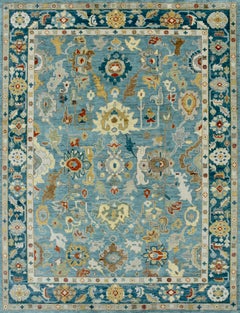 Hand-Knotted Oushak Style Wool Rug in Light Blue & Deep Blue with Floral Motifs