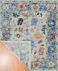 Hand-Knotted Oushak Style Wool Rug in Light Blue, Ivory and Multi-Color Accents