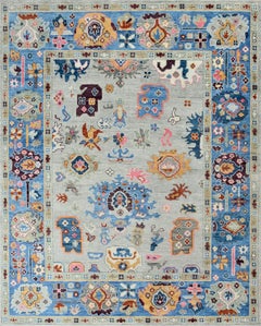 Hand-Knotted Oushak Style Wool Rug in Light Blue, Ivory and Multi-Color Accents