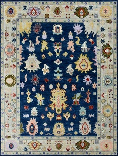 Hand-Knotted Oushak Style Wool Rug in Navy Blue, Ivory and Multi-Color Accents