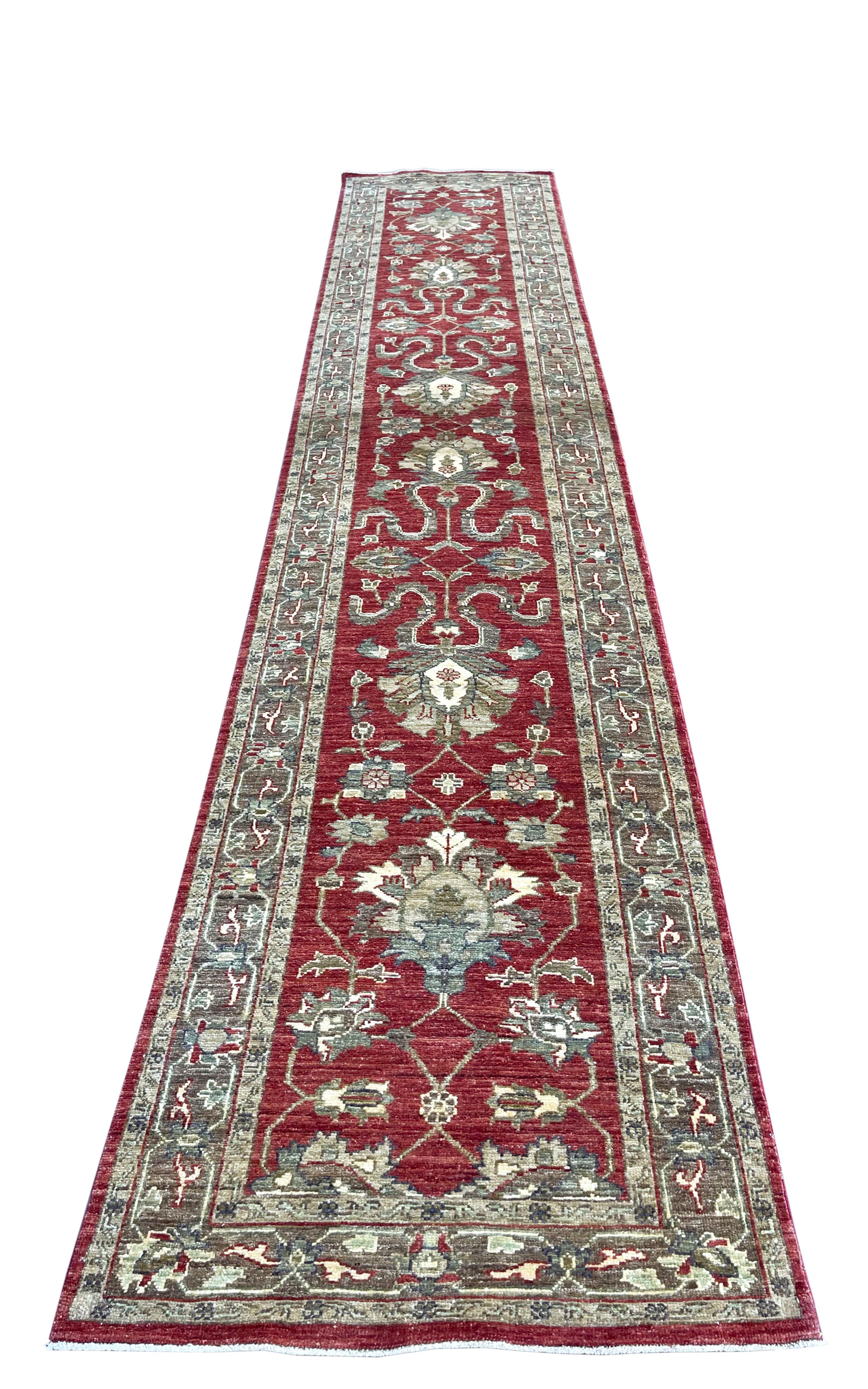 This Peshawar Pakistan rug is a fine knotted with a wool pile and cotton weft. The base color is dark orange and the border is brown. The Peshawar rugs are in high demand across the market because their design, quality and color combination. The