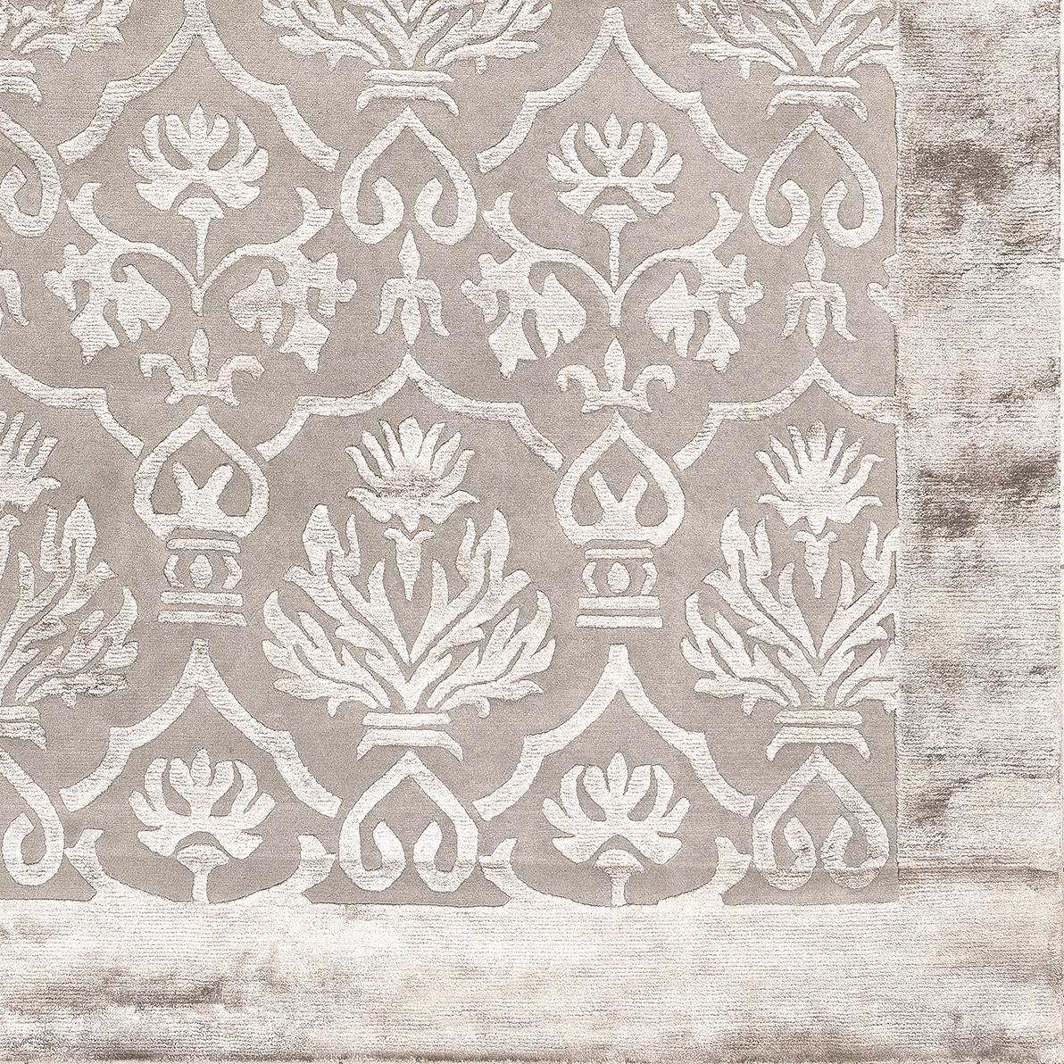 Classic design inspired to antique Fine Middle Eastern damask rugs from Illulian's Palace Collection.
This rug is hand knotted in Nepal by our artisans by using 50% silk and 50% fine Himalayan wool dyed using vegetable and mineral pigments. The base