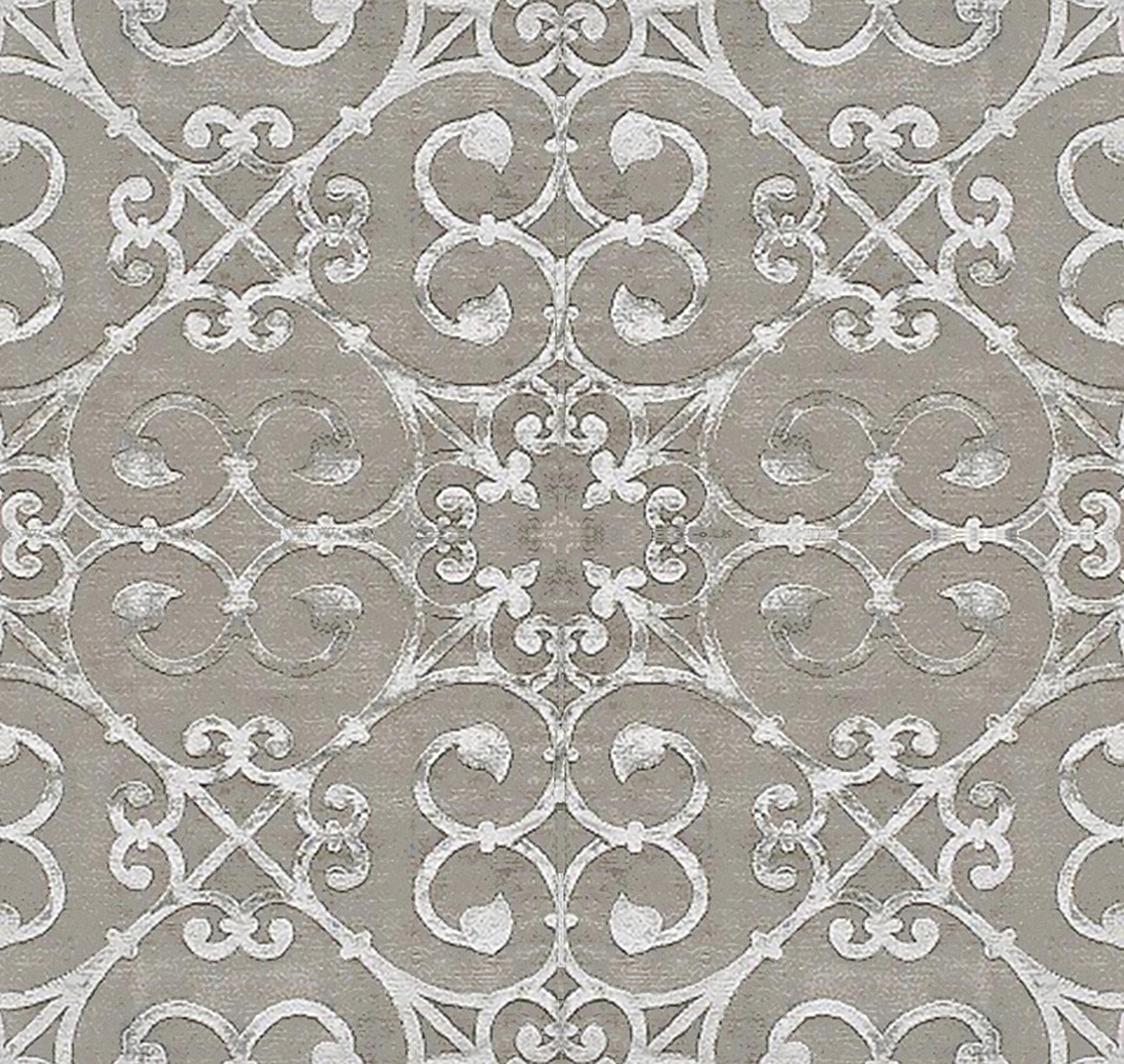 Great tribute to the working of wrought iron, material which has been able to decorate the most prestigious buildings in the world. 
This rug is hand knotted in Nepal by our artisans by using 50% silk and 50% fine Himalayan wool dyed using vegetable