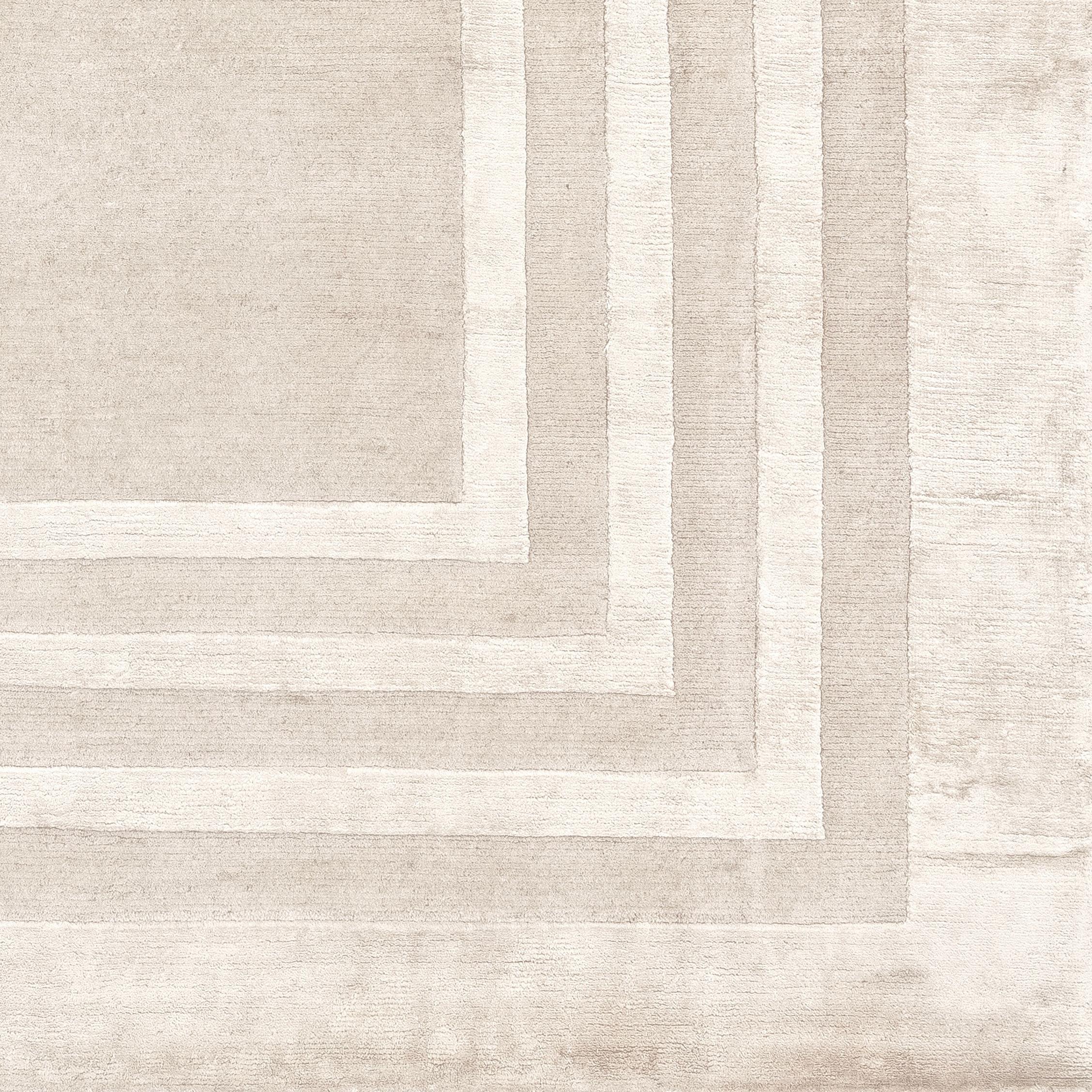 Frame III Borders stands among timeless classic suitable for lovers of minimal elegance.
This rug is hand knotted in Nepal by our artisans by using 20% silk and 80% fine Himalayan wool dyed using vegetable and mineral pigments. The base is 5 mm