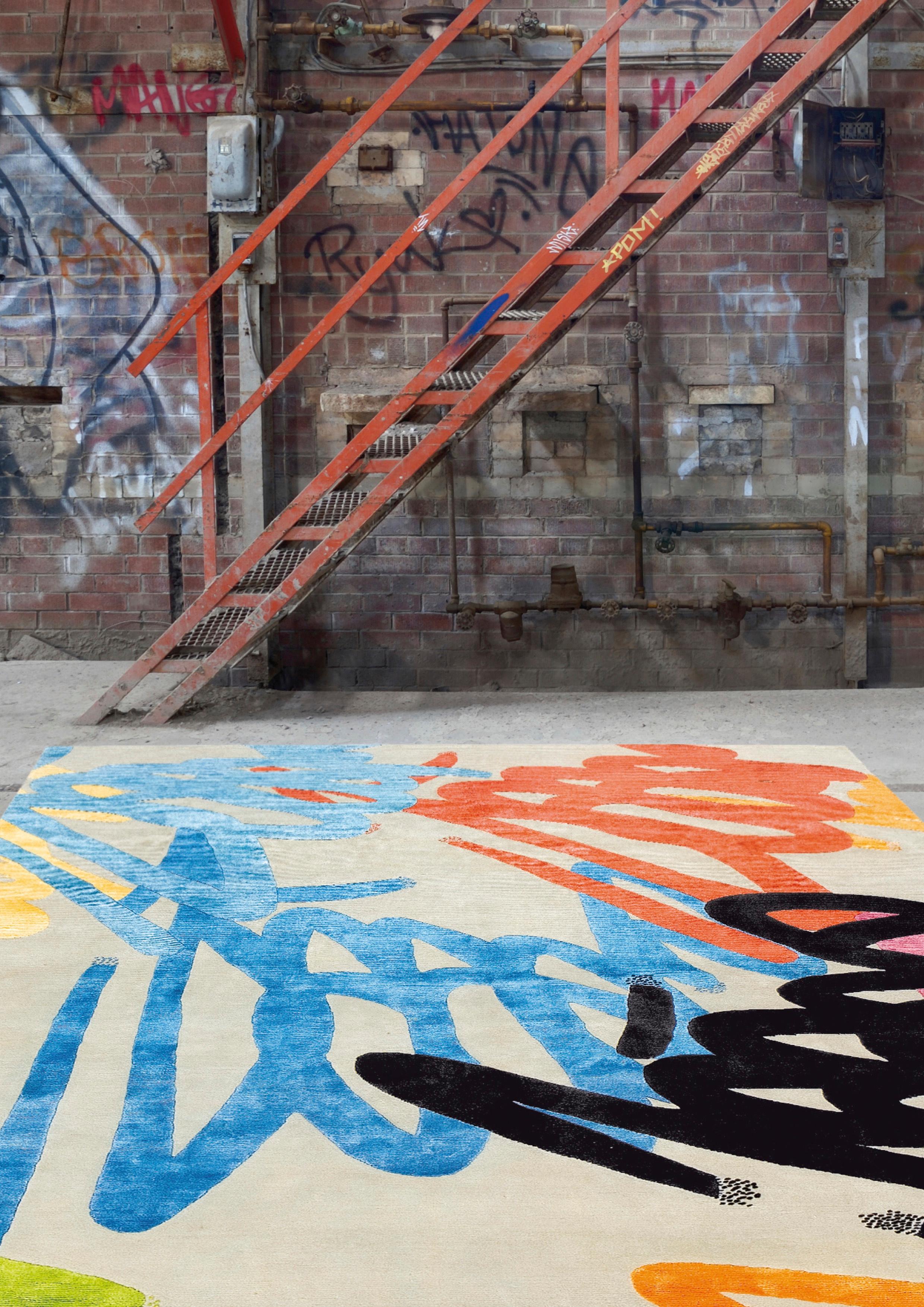 The Manhattan rug is a pulsing example of street culture that has entered fully into contemporary culture and homes with its colorful graffiti and vibrant gestures.
This rug is hand knotted in Nepal by our artisans by using 50% silk and 50% fine