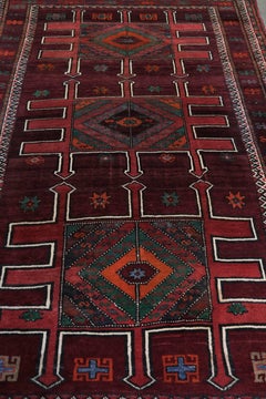 Hand-knotted rug of 308x210cm in oriental style with mainly red colours
