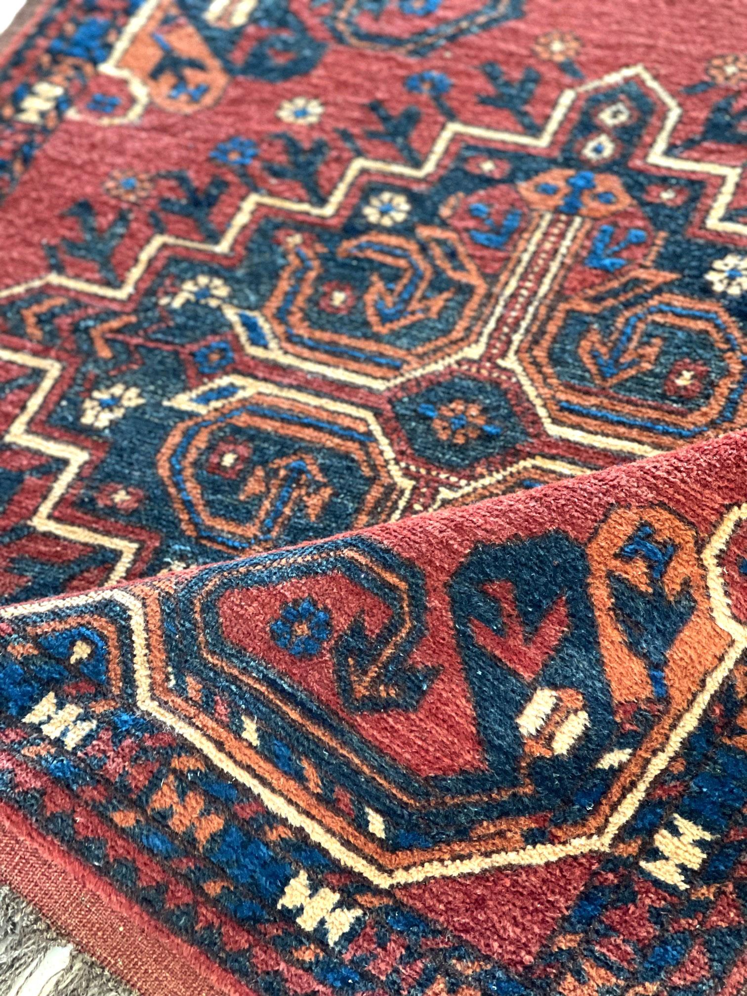 Hand Knotted Tribal Repeated Medallion Rust Blue Afghan Rug 1990 Circa For Sale 4