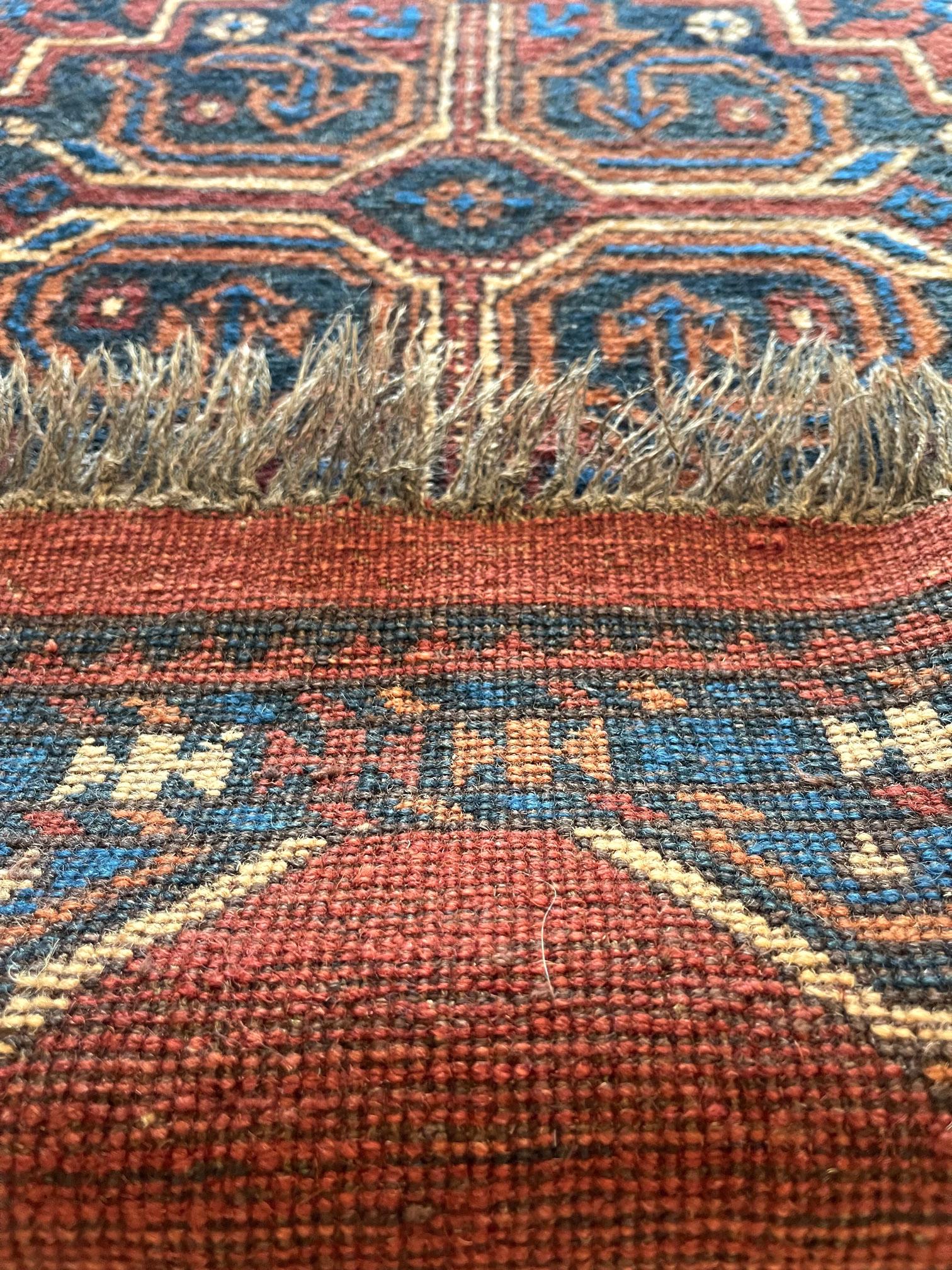 Hand Knotted Tribal Repeated Medallion Rust Blue Afghan Rug 1990 Circa For Sale 5