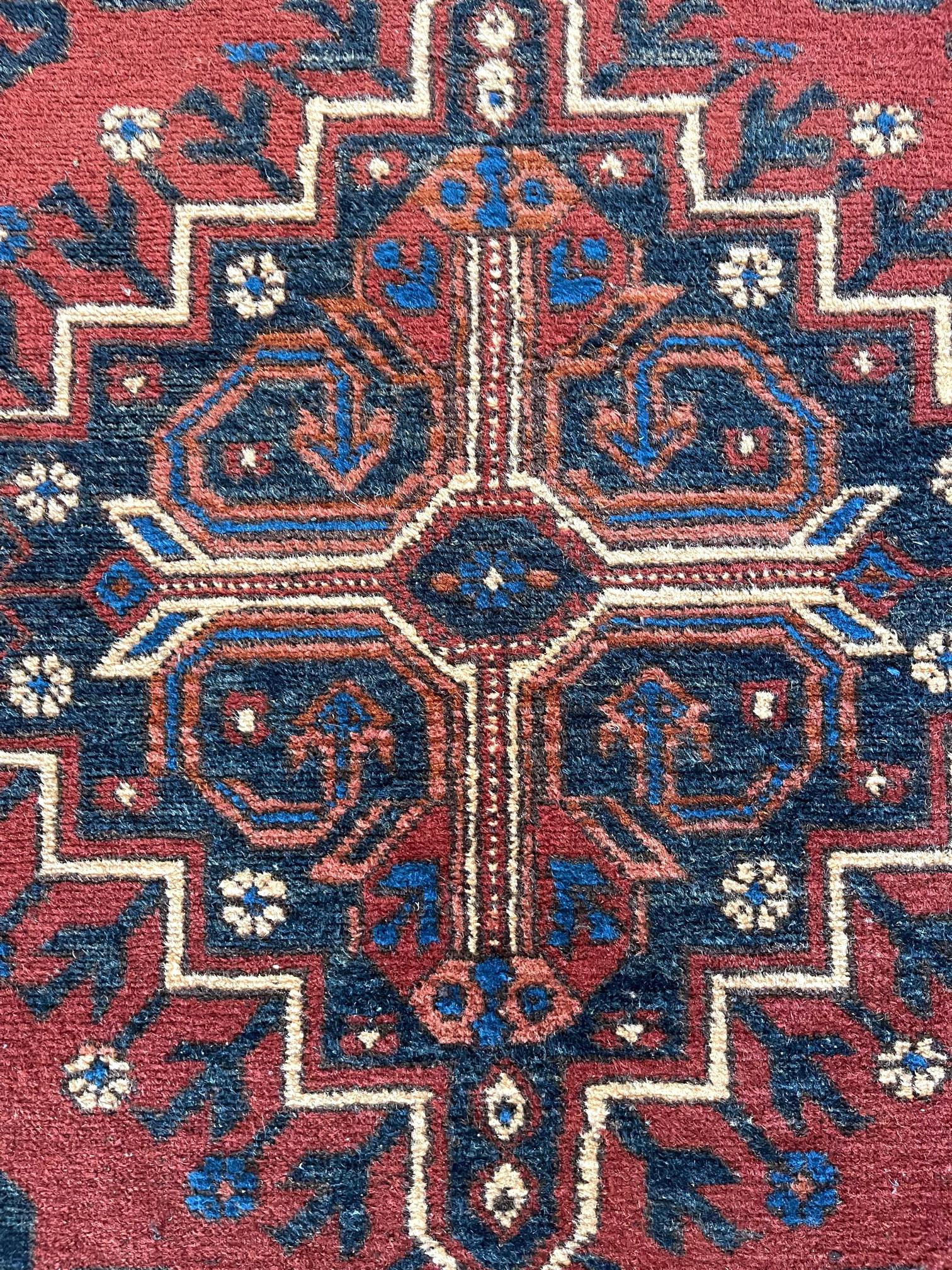 Hand-Knotted Hand Knotted Tribal Repeated Medallion Rust Blue Afghan Rug 1990 Circa For Sale