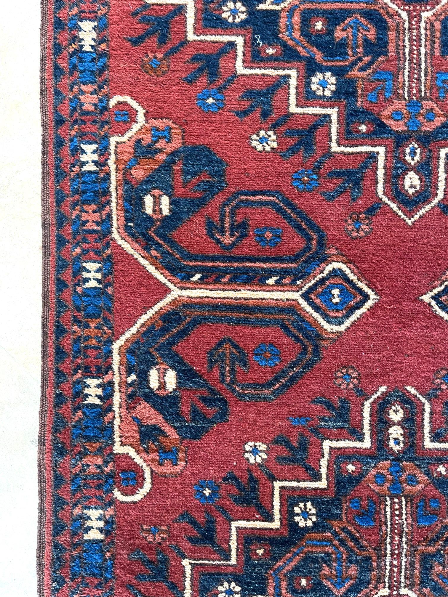 Late 20th Century Hand Knotted Tribal Repeated Medallion Rust Blue Afghan Rug 1990 Circa For Sale