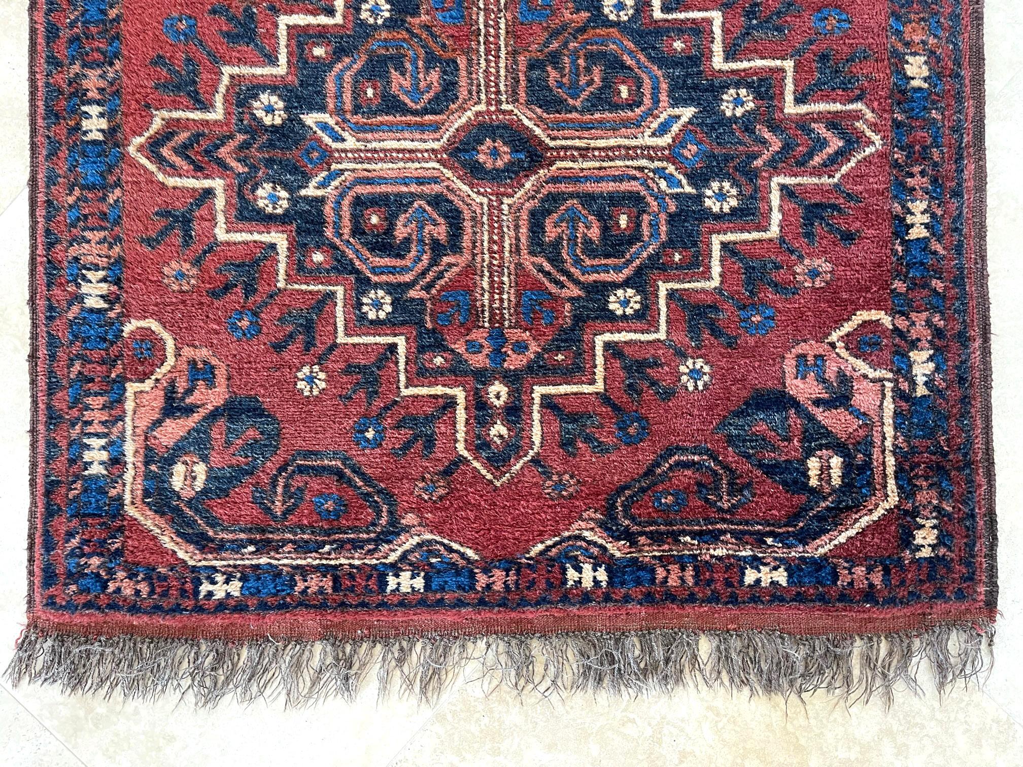 Wool Hand Knotted Tribal Repeated Medallion Rust Blue Afghan Rug 1990 Circa For Sale