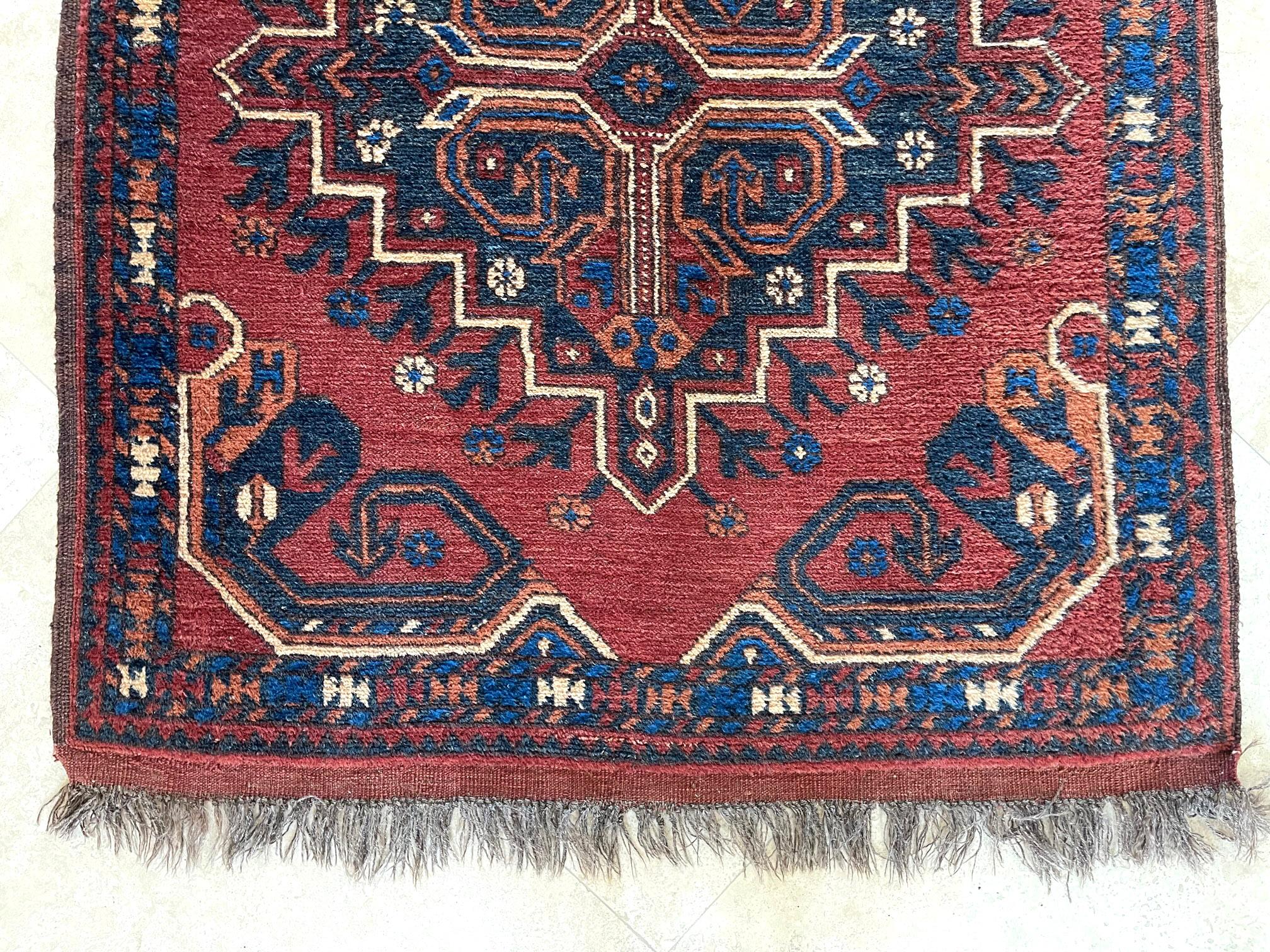 Hand Knotted Tribal Repeated Medallion Rust Blue Afghan Rug 1990 Circa For Sale 1