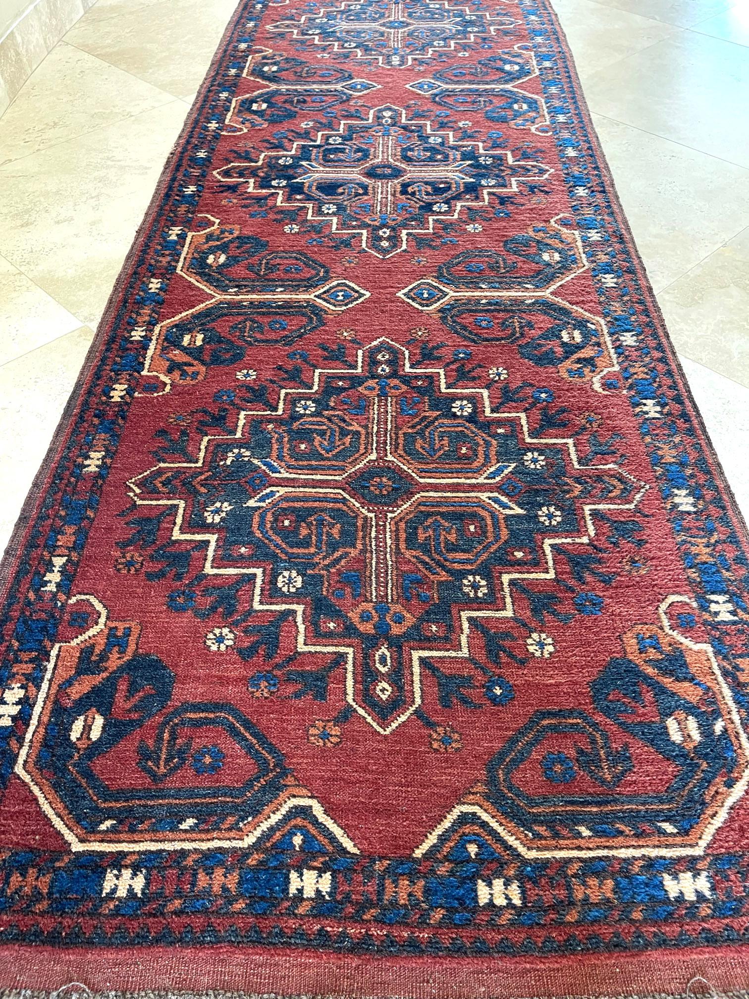 Hand Knotted Tribal Repeated Medallion Rust Blue Afghan Rug 1990 Circa For Sale 3
