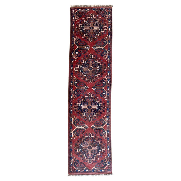 Hand Knotted Tribal Repeated Medallion Rust Blue Afghan Rug 1990 Circa For Sale at 1stDibs
