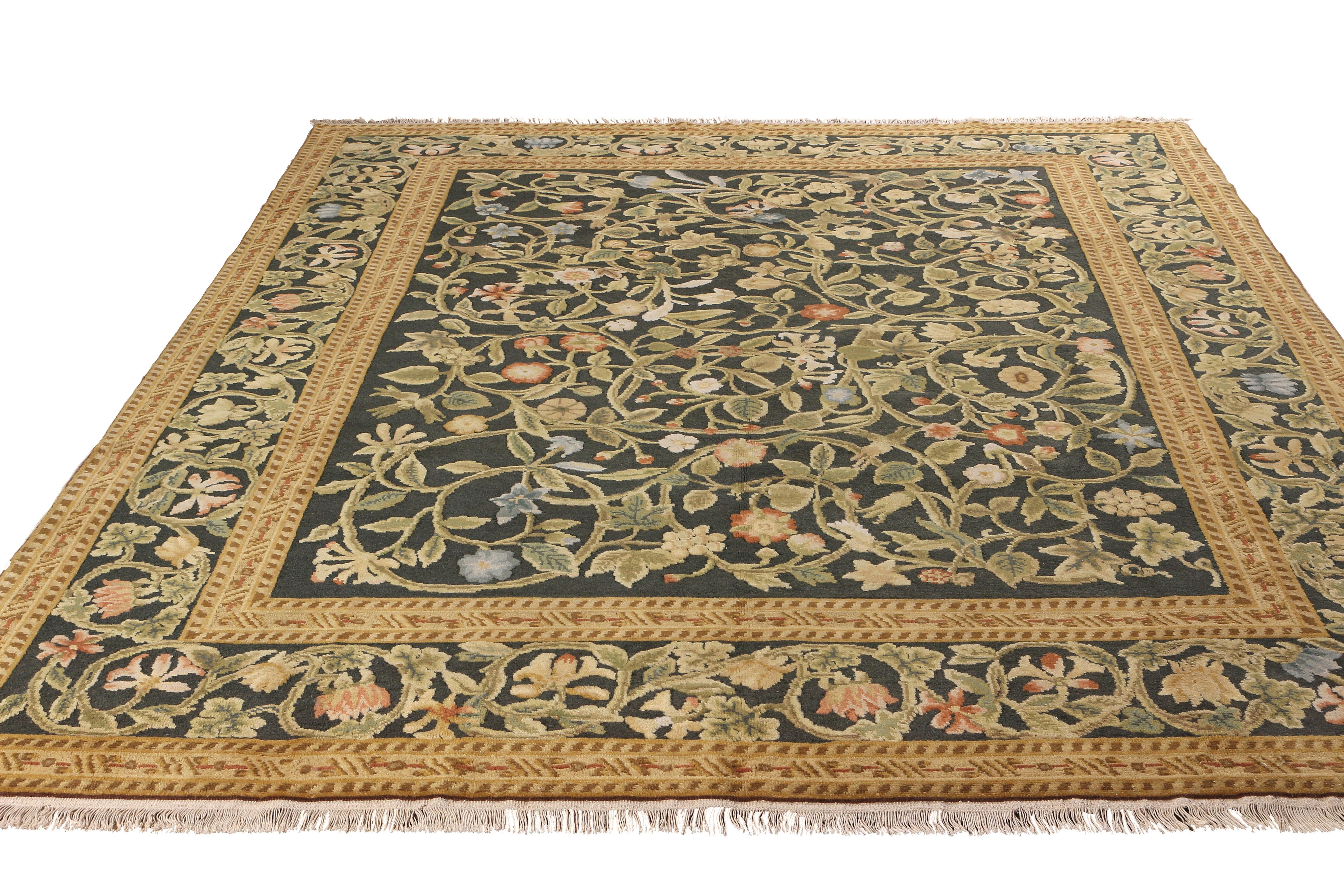 Hand knotted in a quality wool, this addition to the European rug collection by Rug & Kilim draws influence from the 18th century Tudor rug style, an exemplary piece reimagined in high-and-low pile recapturing a kingly floral pattern in