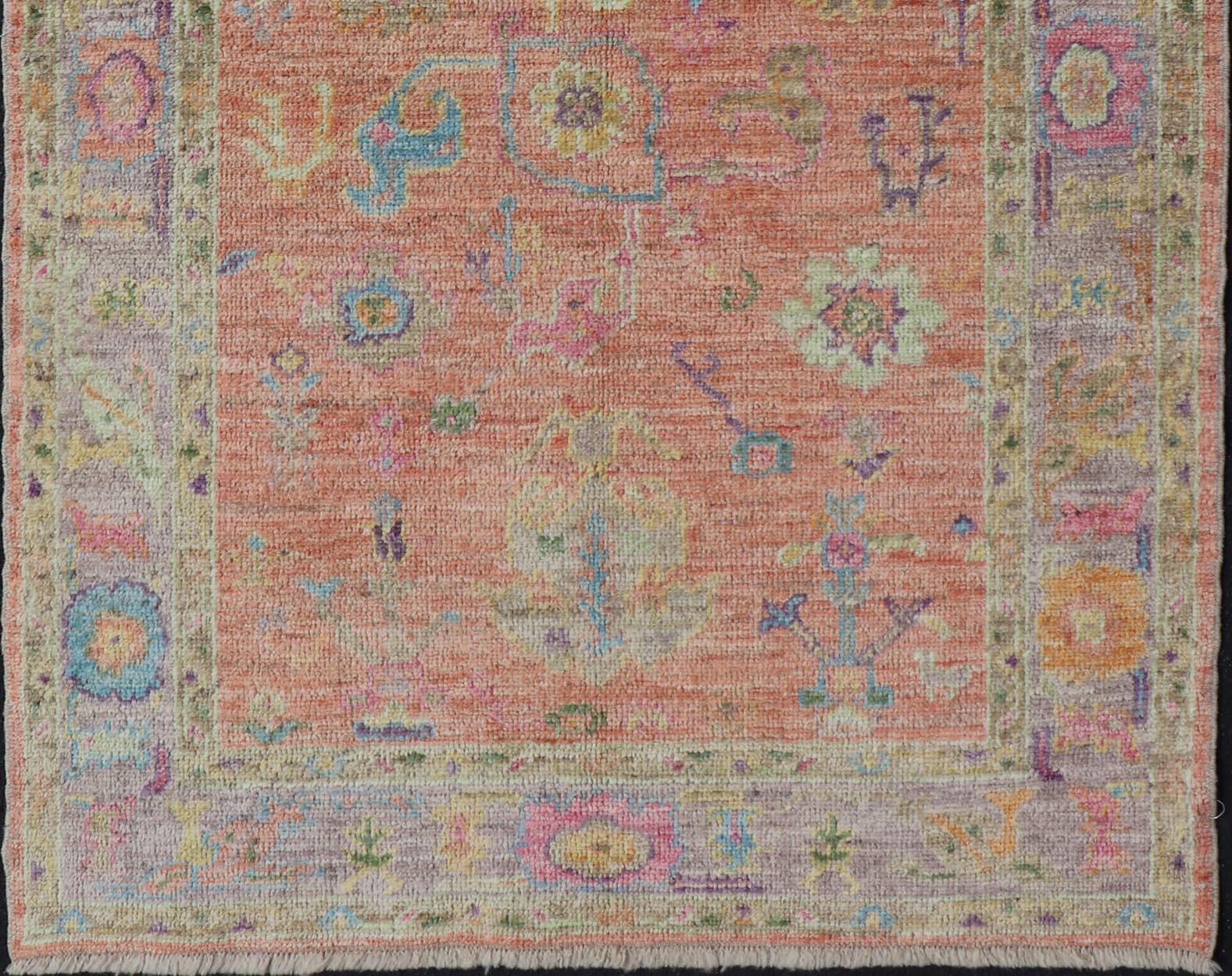 Contemporary Hand Knotted Turkish Floral Oushak with Orange Background and Lilac Border  For Sale