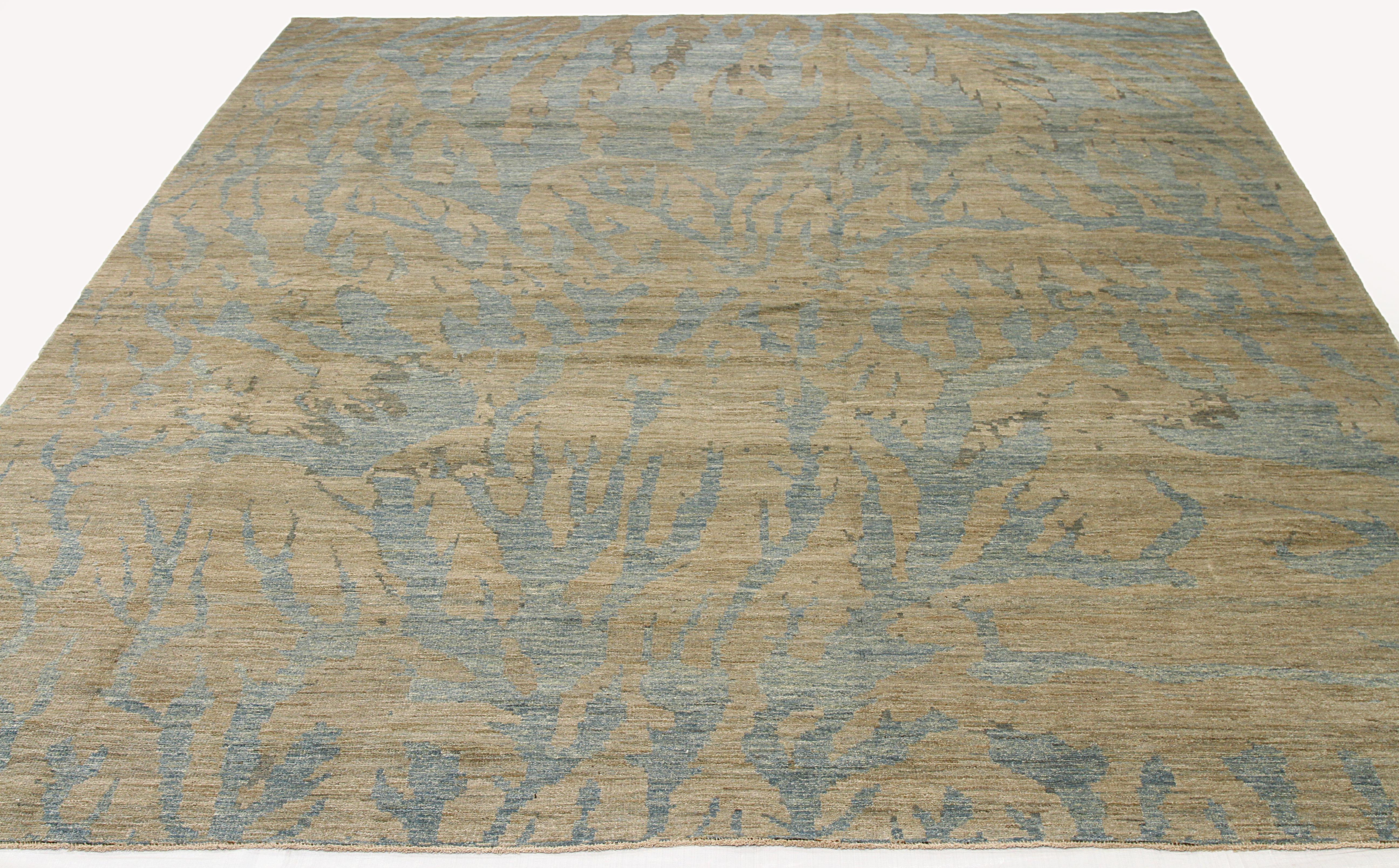 Modern hand knotted Turkish rug made from fine wool and all-natural vegetable dyes that are safe for people and pets. This lovely piece features floral design patterns woven in traditional Sultanabad style that originated in ancient Iran. The color