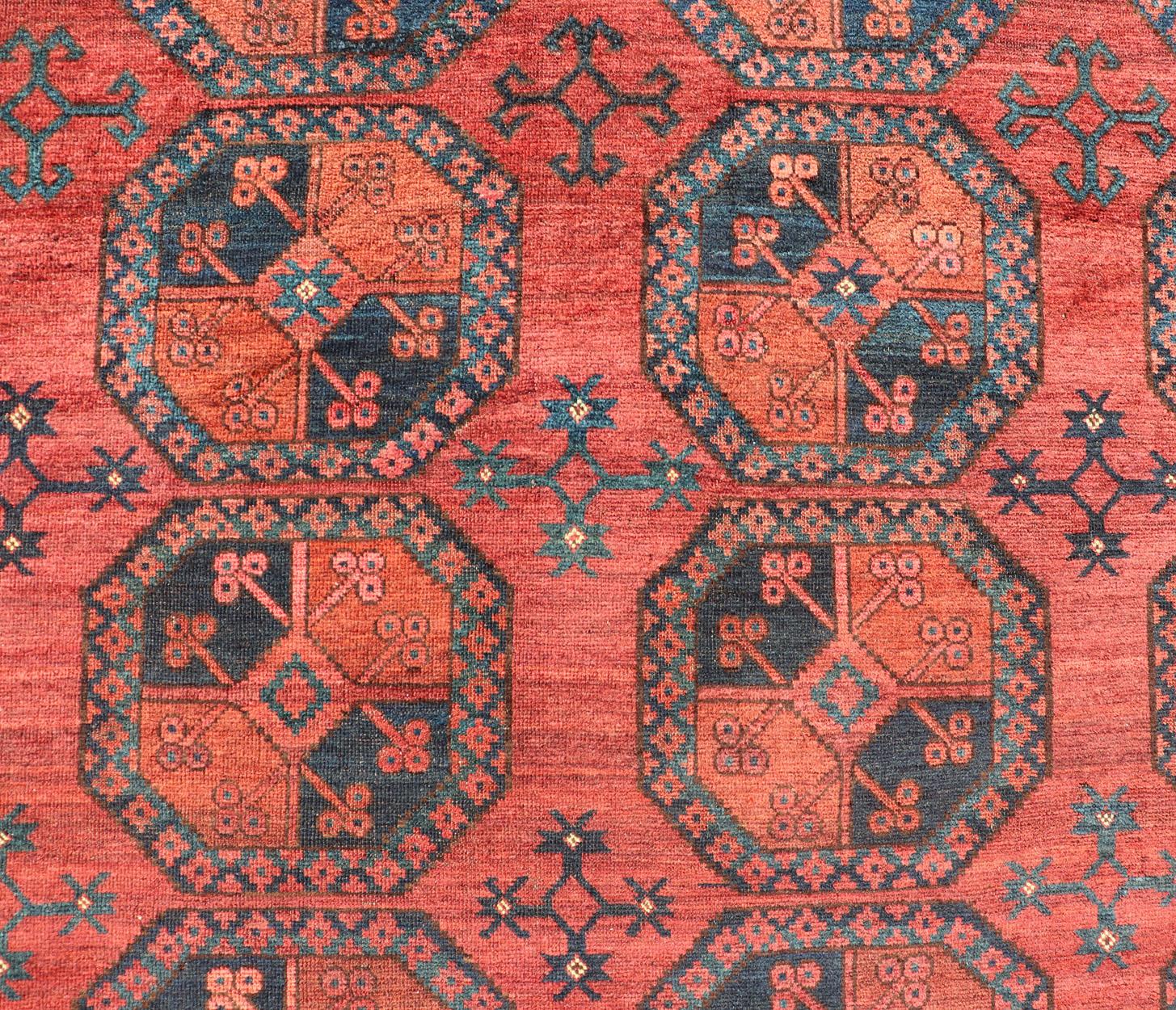 Tappeto Turkomen Ersari in lana, annodato a mano, con disegno Gul in rosso, arancione e blu. in vendita 3