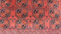 Handgeknüpfter turkmenischer Ersari-Teppich aus Wolle mit Gul-Muster in Rot, Orange und Blau