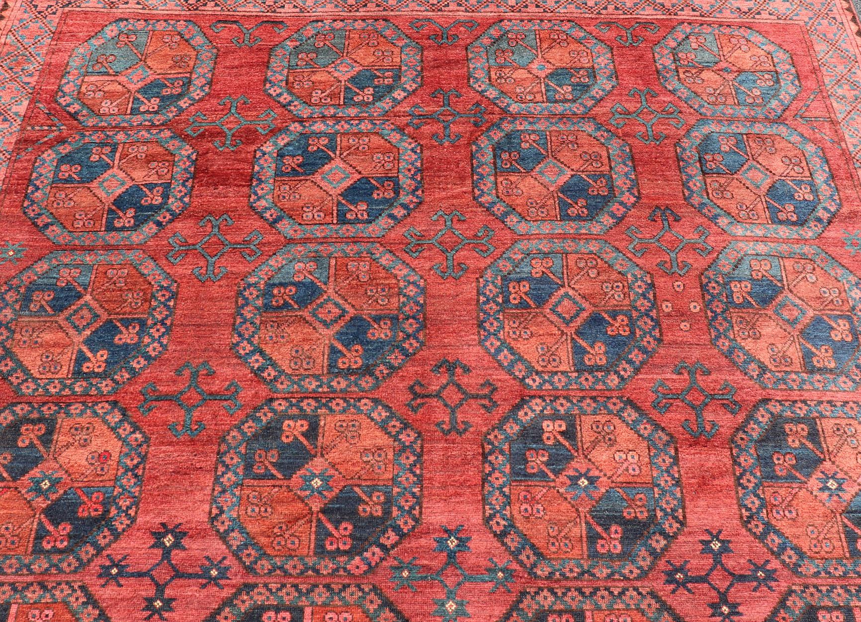 Hand-Knotted Turkomen Ersari Rug in Wool with Gul Design in Red, Orange and Blue In Good Condition For Sale In Atlanta, GA