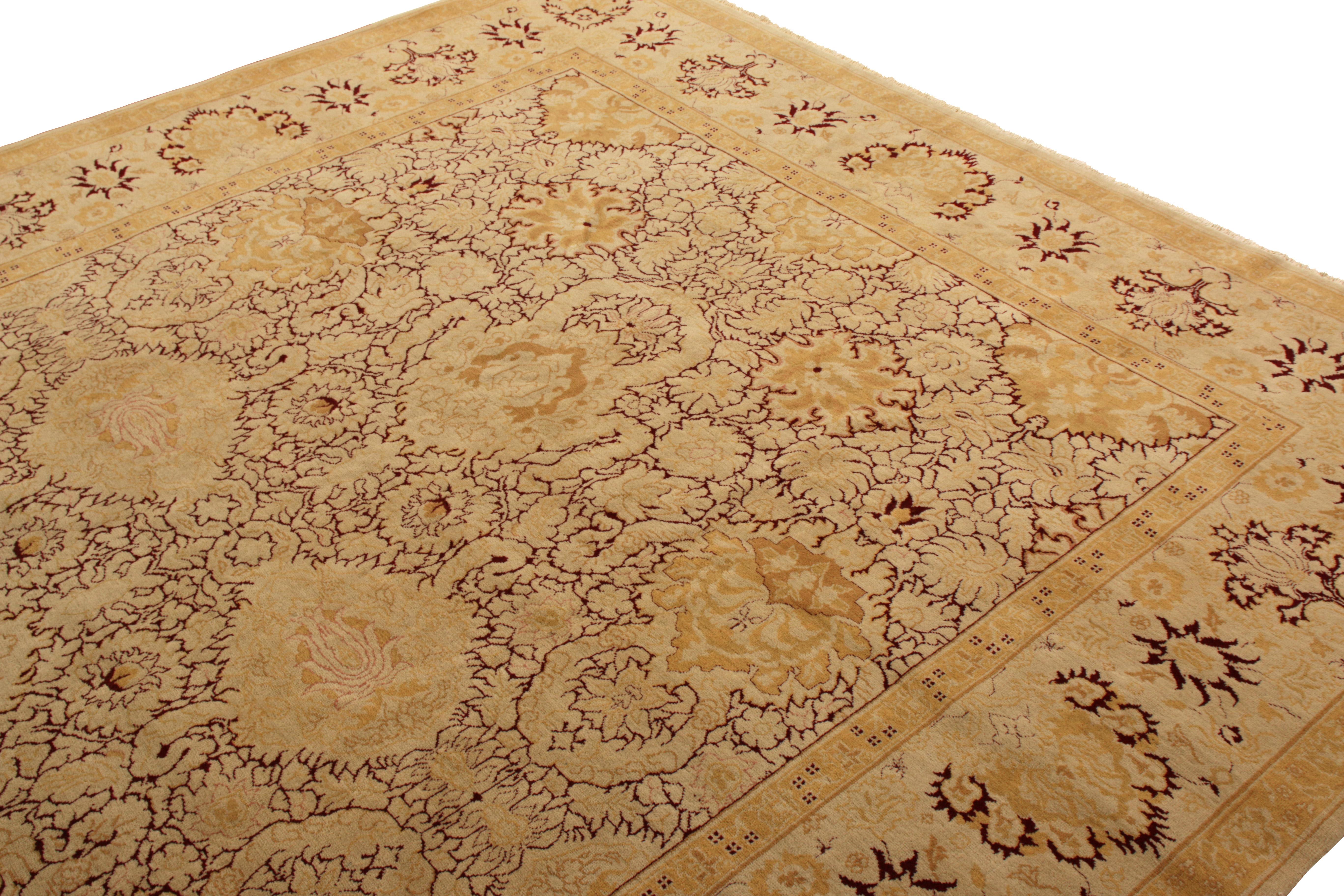 Made with hand-knotted wool in 9x12 size circa 1980, this vintage Agra rug hails from the one of the earliest traditional designs in the Modern Classics collection by Rug & Kilim, acquired from the work of Berj Adatjian—one of the premiere creators
