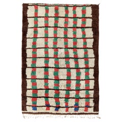 Tapis berbère marocain vintage beige-marron à motif géométrique de Rug & Kilim