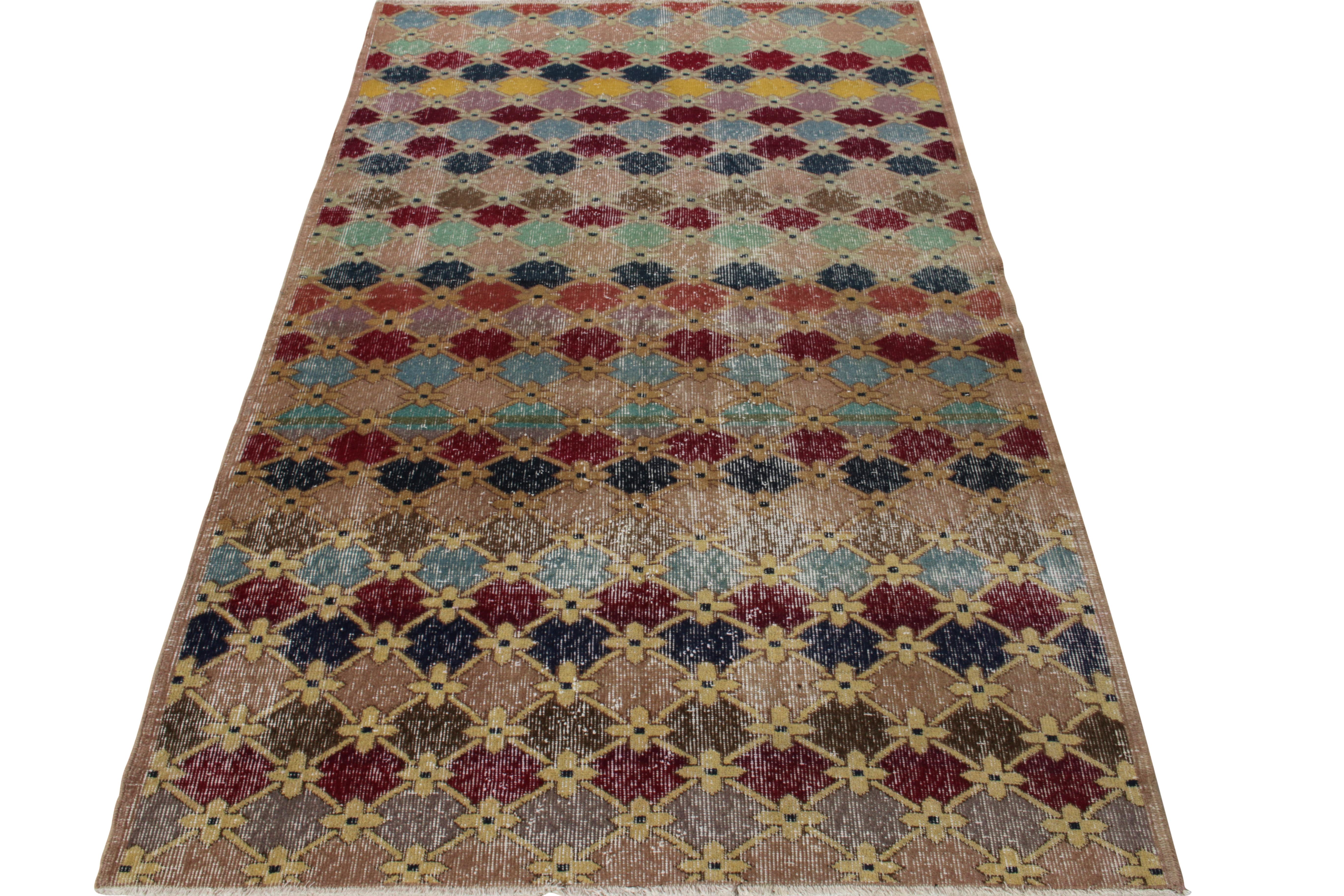 Originating from Turkey circa 1960-1970, a vintage Art Deco rug from a celebrated Turkish artist, entering Rug & Kilim’s coveted Mid-Century Pasha Collection. The rug beholds a mid-century modern vision wrapped in classic Art Deco aesthetics which