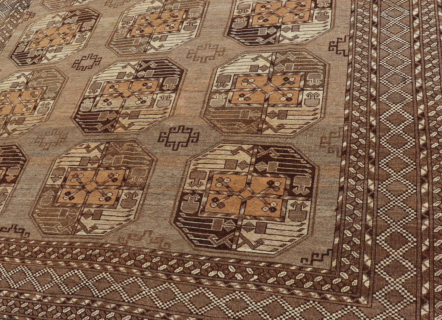 Islamic Hand-Knotted Vintage Ersari Rug with Gul Design in Brown, Ivory  & Almond For Sale
